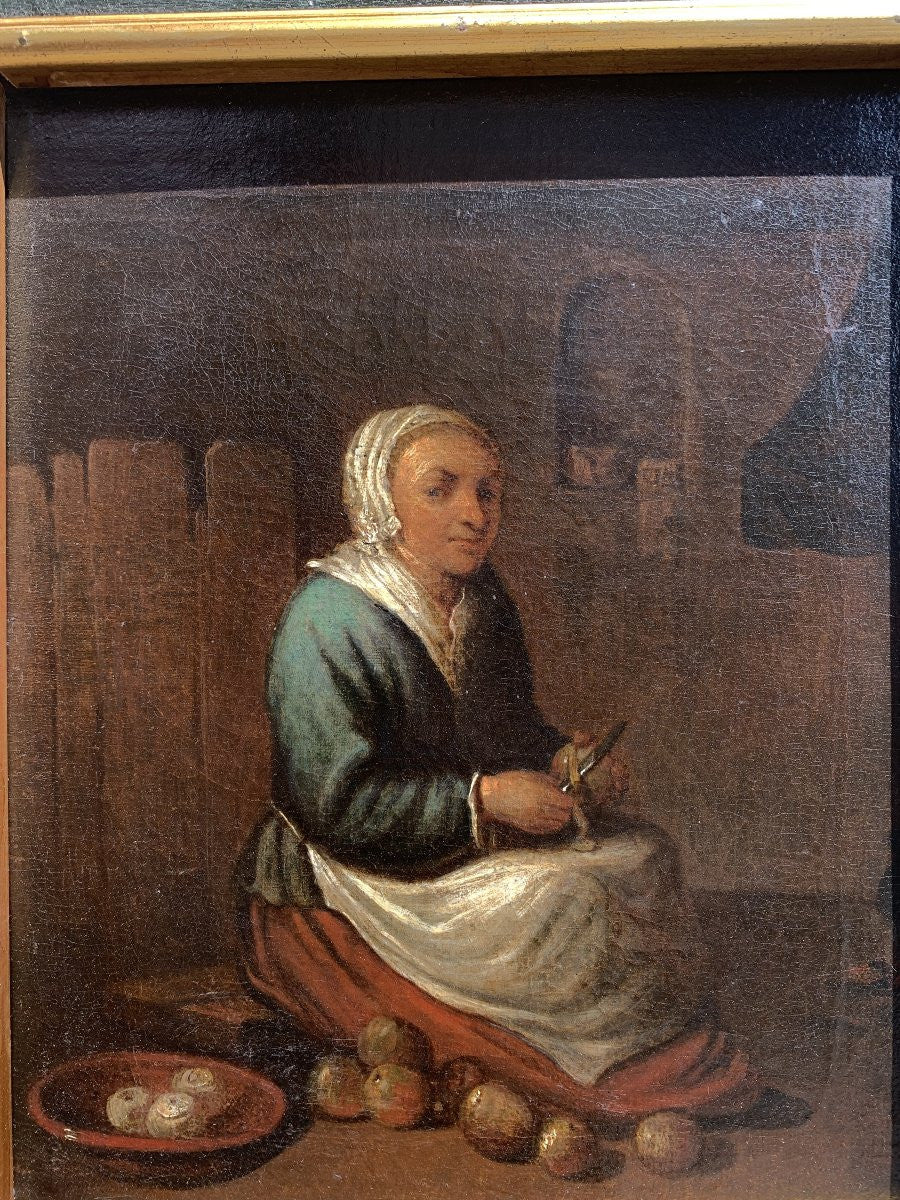 Dutch School, late 17th – early 18th century. Scene with Cook Peeling Apples