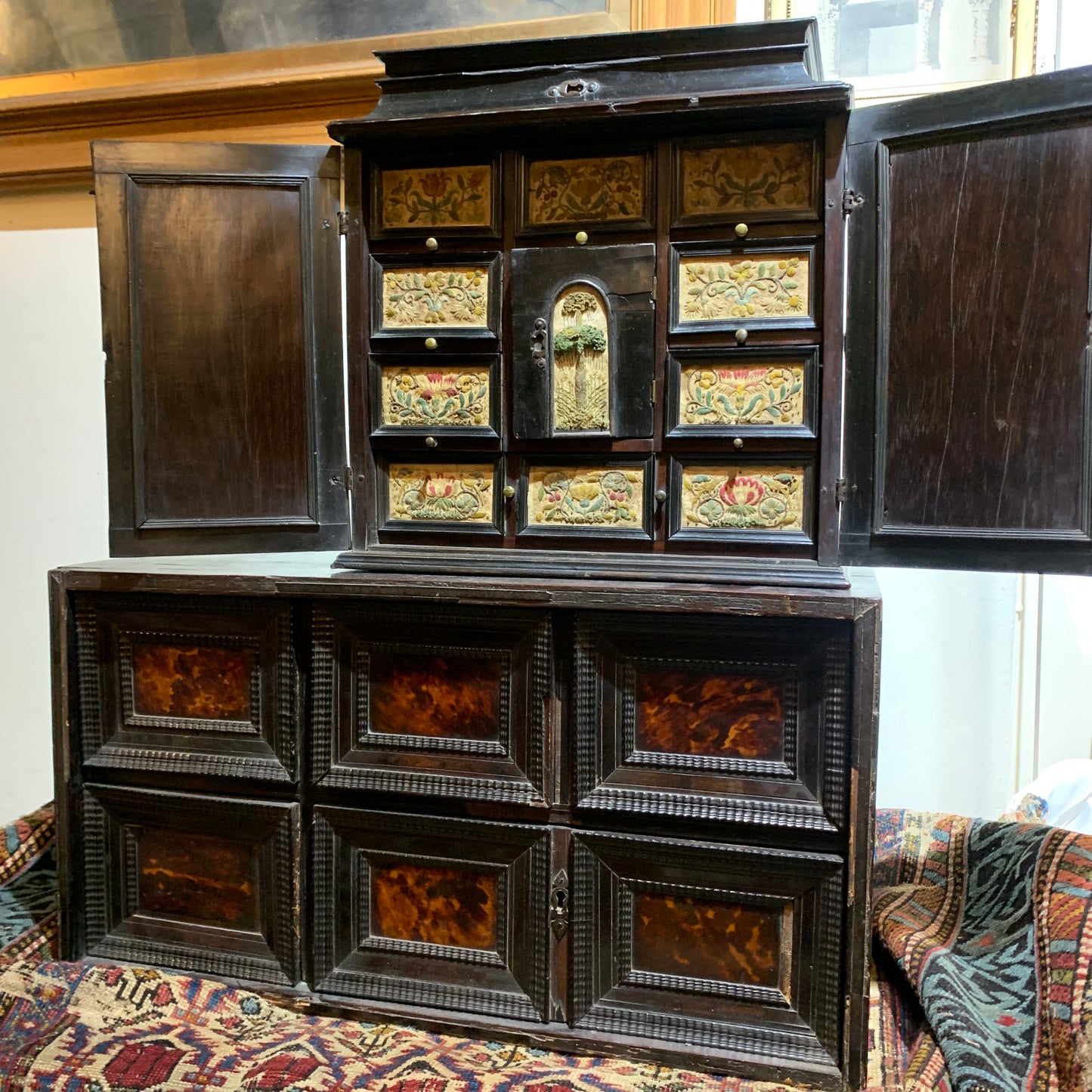 Very rare Collector's Cabinet, Antwerp, 17th century. Embroidered panels.