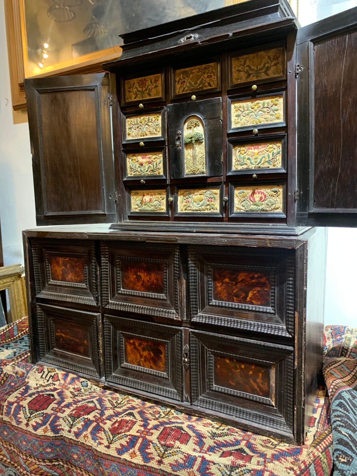 Very rare Collector's Cabinet, Antwerp, 17th century. Embroidered panels.