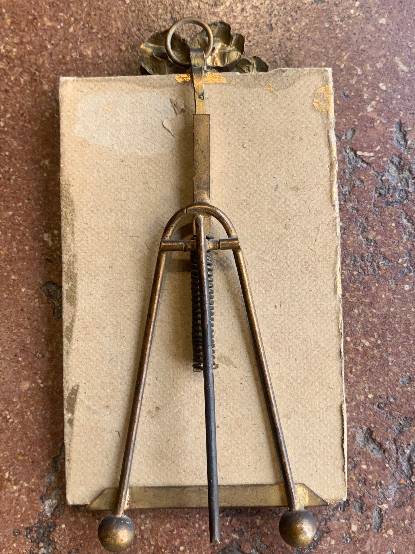 A miniature portrait of an elegant man in a black tie and pleated shirt with jewel buttons, dated 1833.