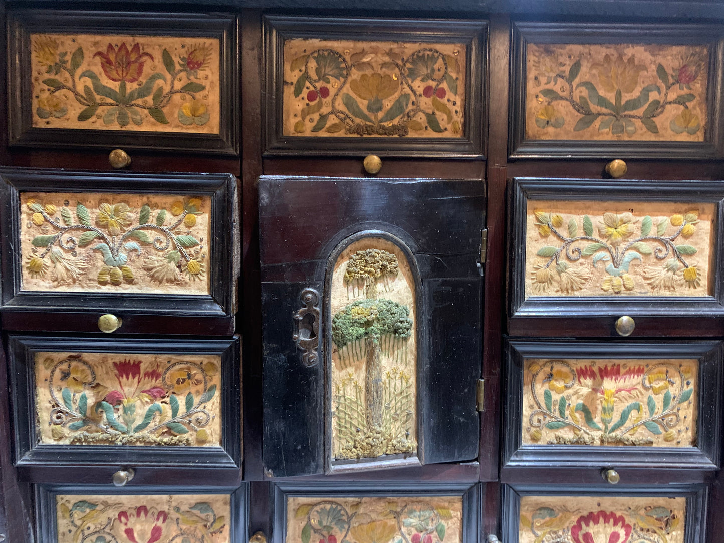 Very rare Collector's Cabinet, Antwerp, 17th century. Embroidered panels.