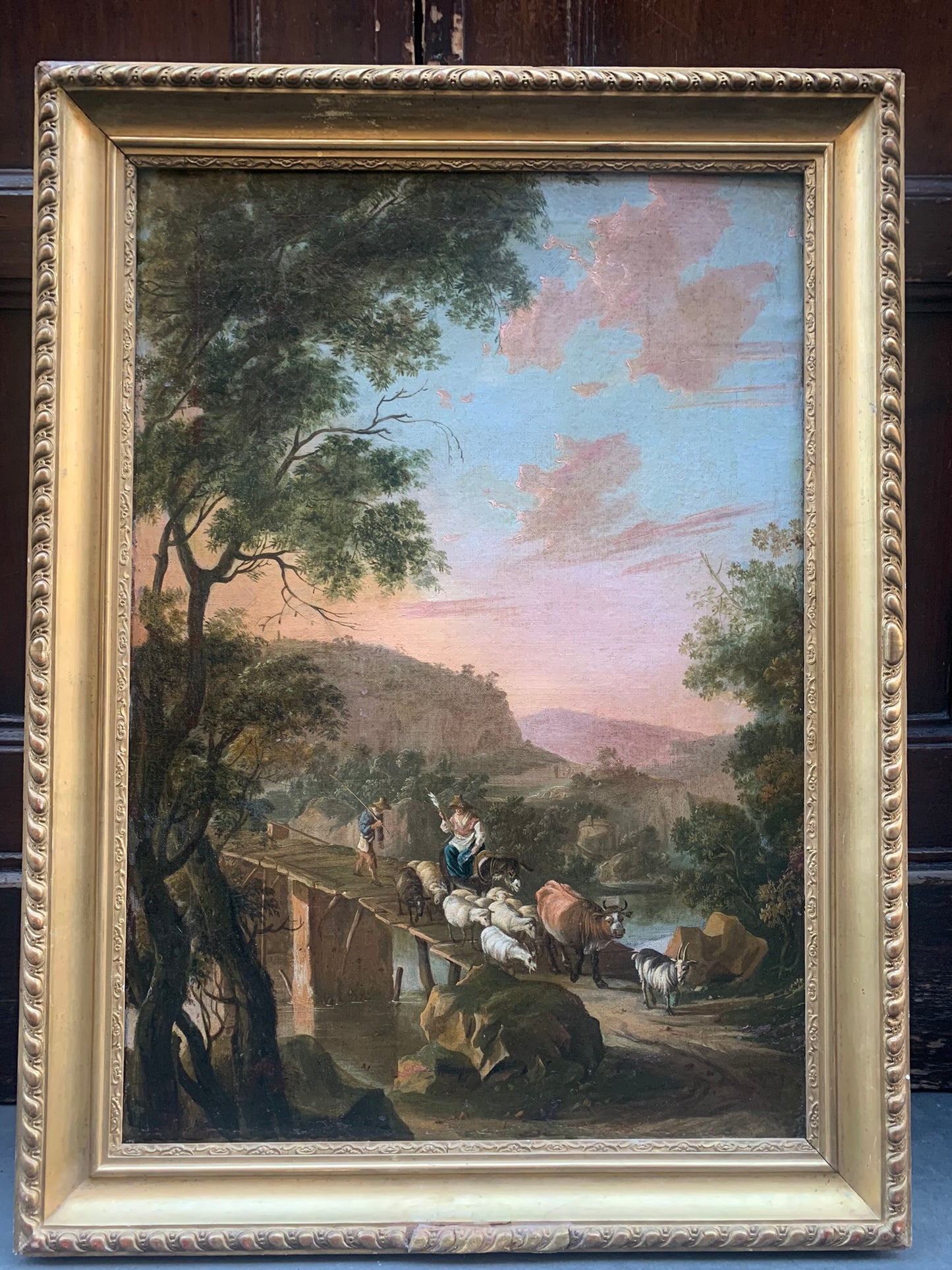 Circle of Jan Both  ( Utrecht, 1618-1652).  Italianate landscape with shepherd and a bridge