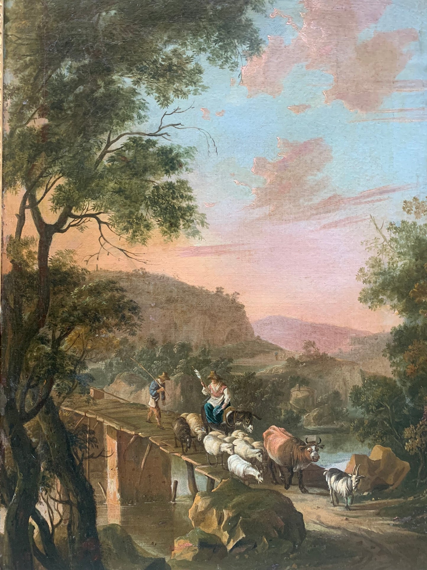 Circle of Jan Both  ( Utrecht, 1618-1652).  Italianate landscape with shepherd and a bridge