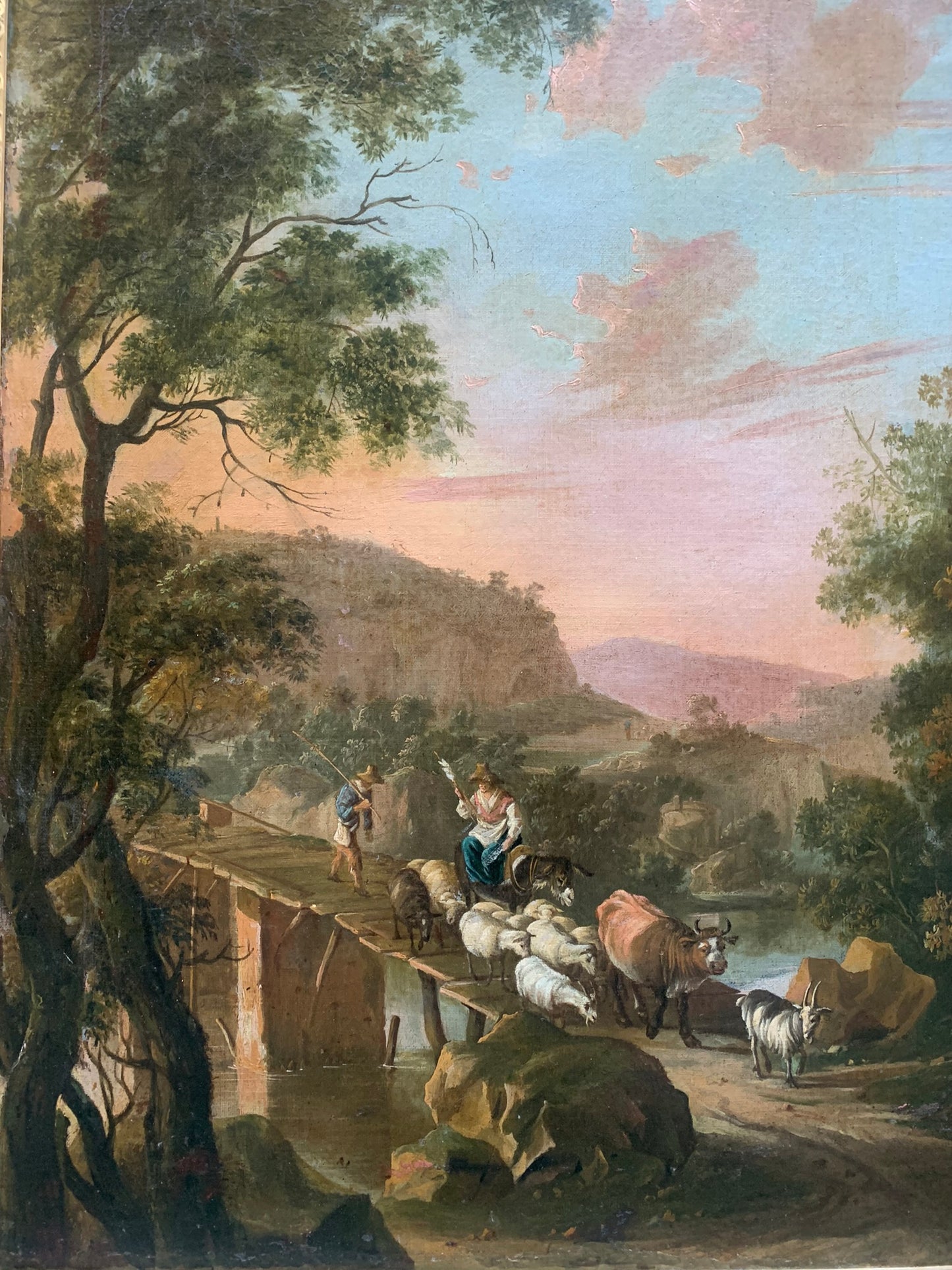 Circle of Jan Both  ( Utrecht, 1618-1652).  Italianate landscape with shepherd and a bridge