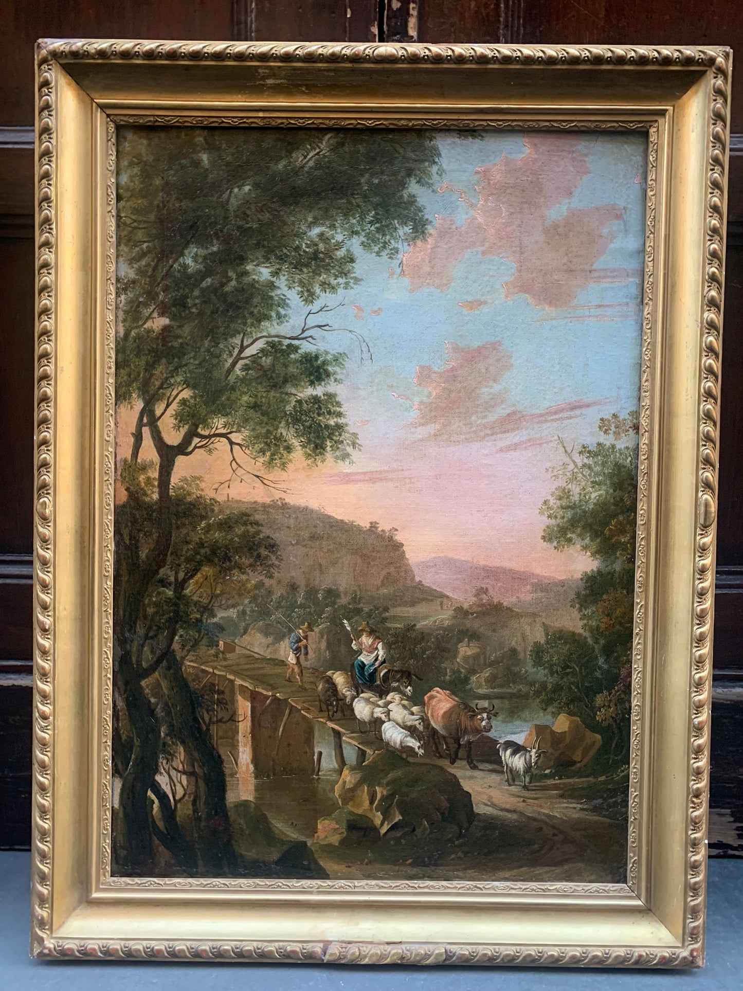 Circle of Jan Both  ( Utrecht, 1618-1652).  Italianate landscape with shepherd and a bridge