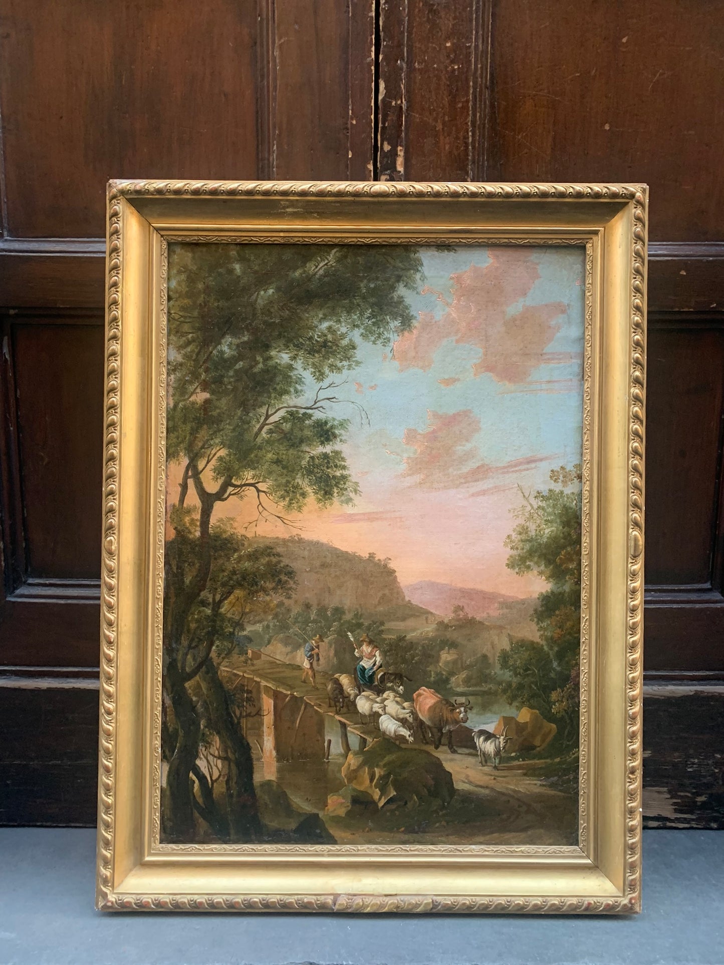 Circle of Jan Both  ( Utrecht, 1618-1652).  Italianate landscape with shepherd and a bridge