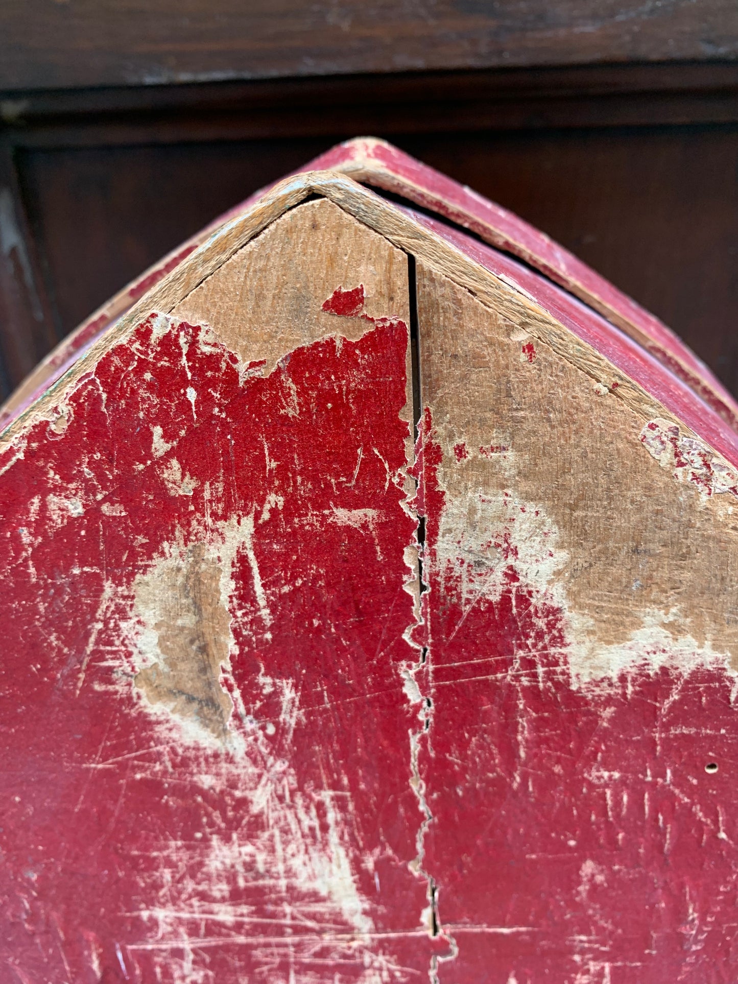 Antique case for a large object in wood and paper.