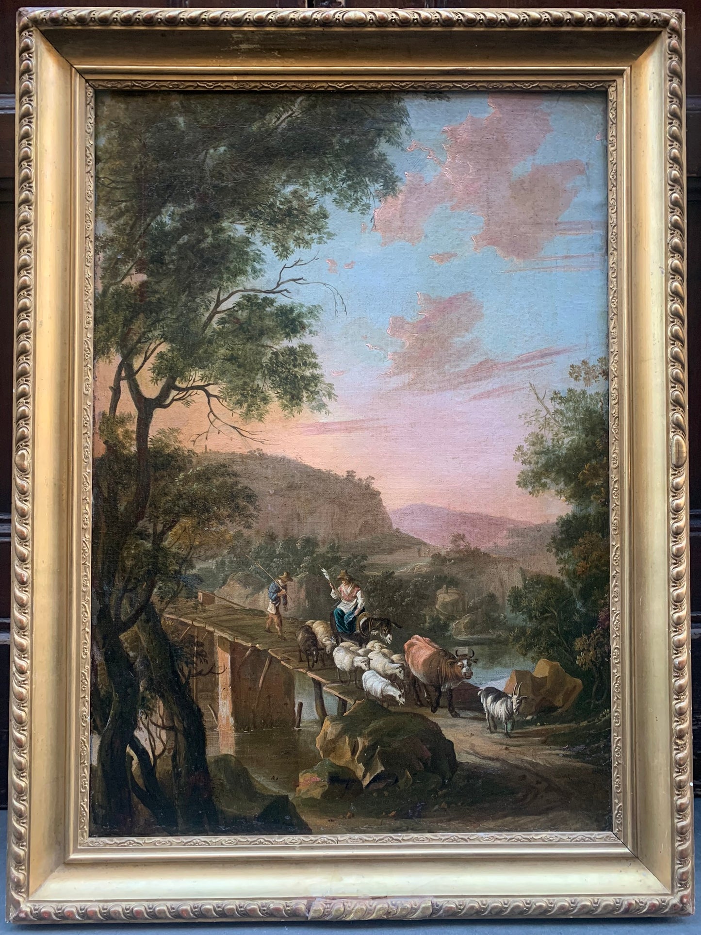 XVIII century. Pastoral landscape with shepherds, bridge and rocky lanscape.