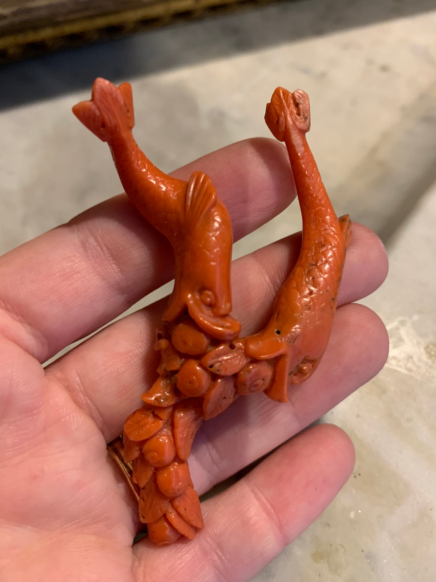 A sculpture - amulet with two dolfins. XIX century