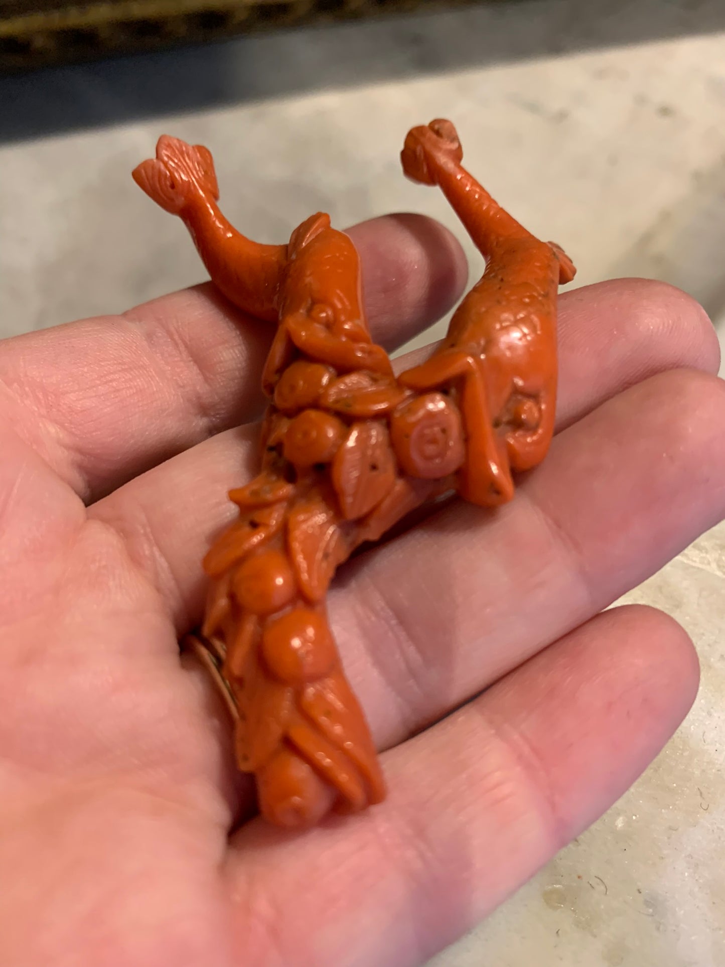 A sculpture - amulet with two dolfins. XIX century