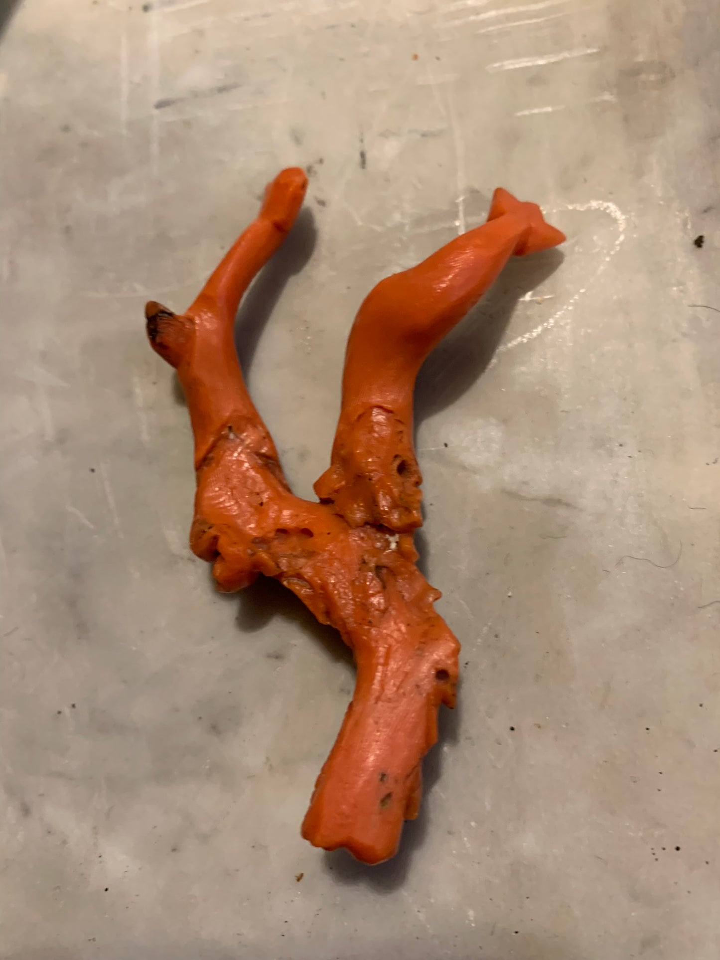 A sculpture - amulet with two dolfins. XIX century