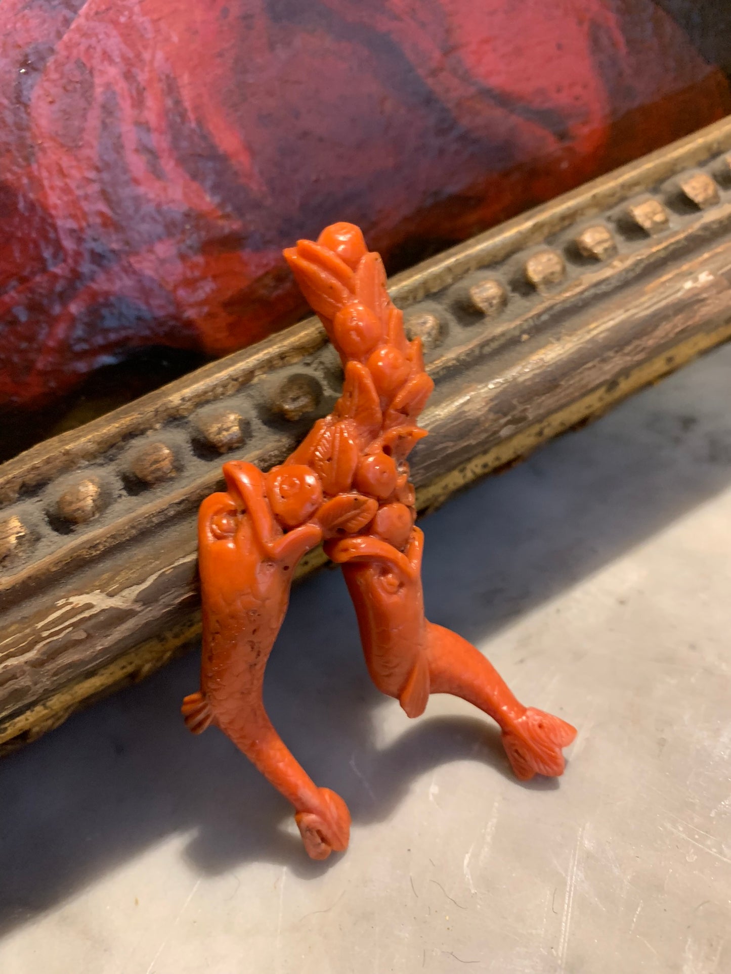 A sculpture - amulet with two dolfins. XIX century