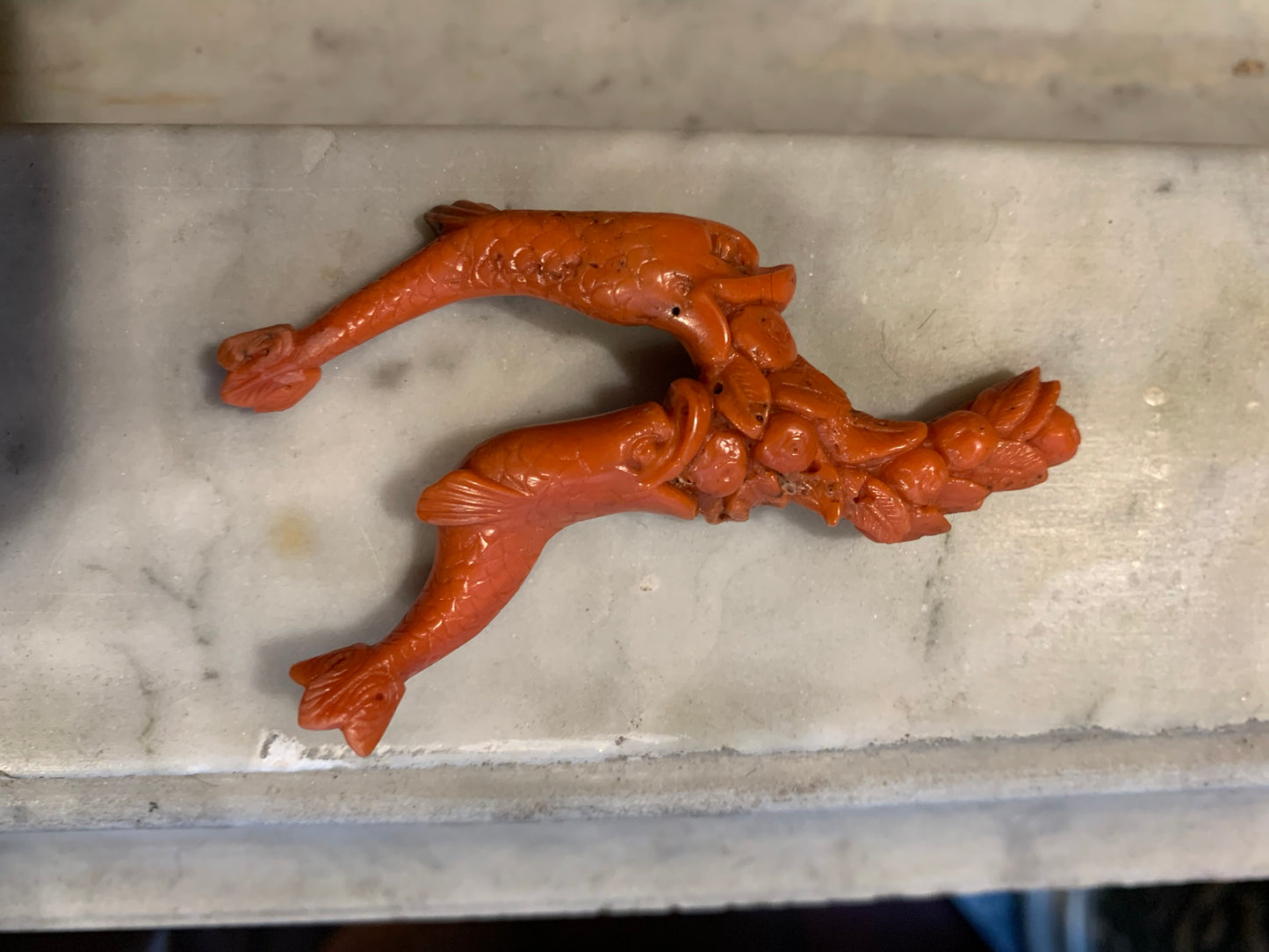 A sculpture - amulet with two dolfins. XIX century