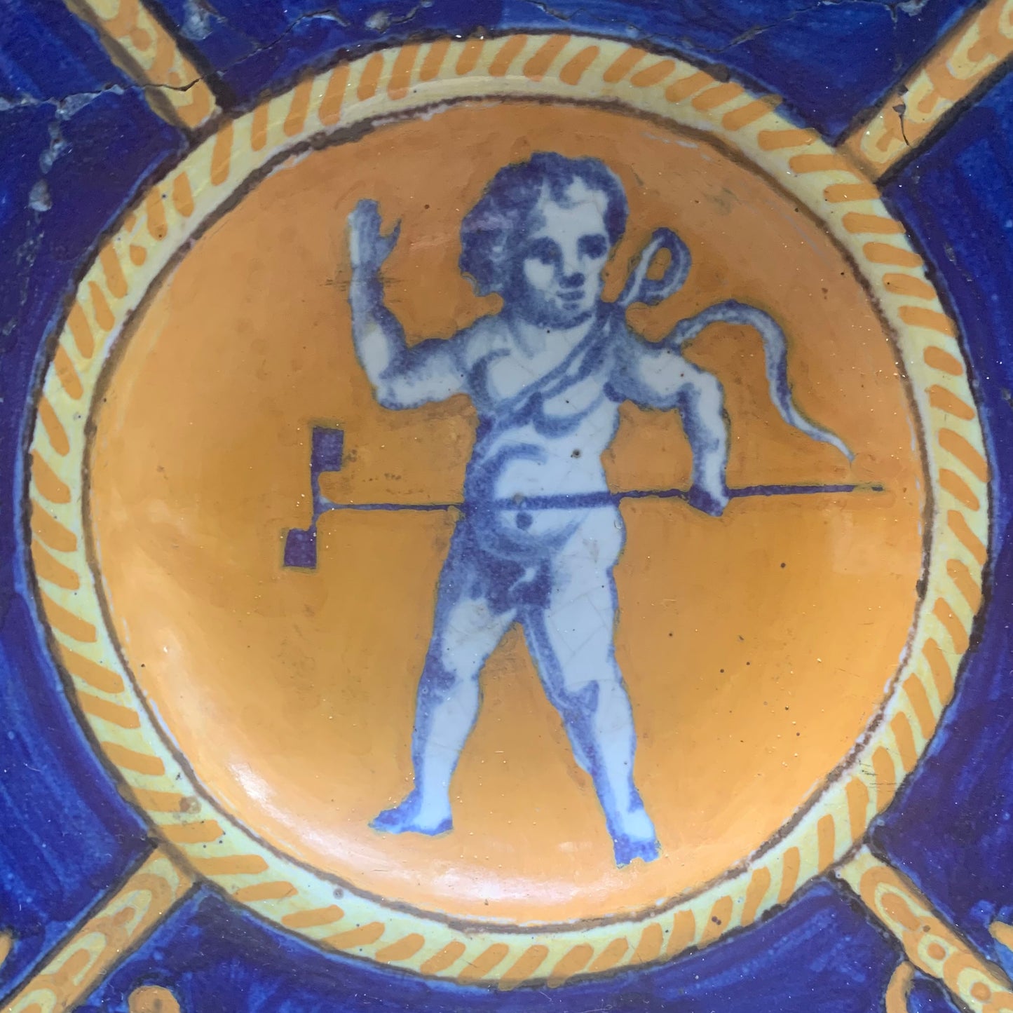 Antique Maiolica Plate From The Late 16th Century With Putto And Toy (pinwheel?) - Urbino