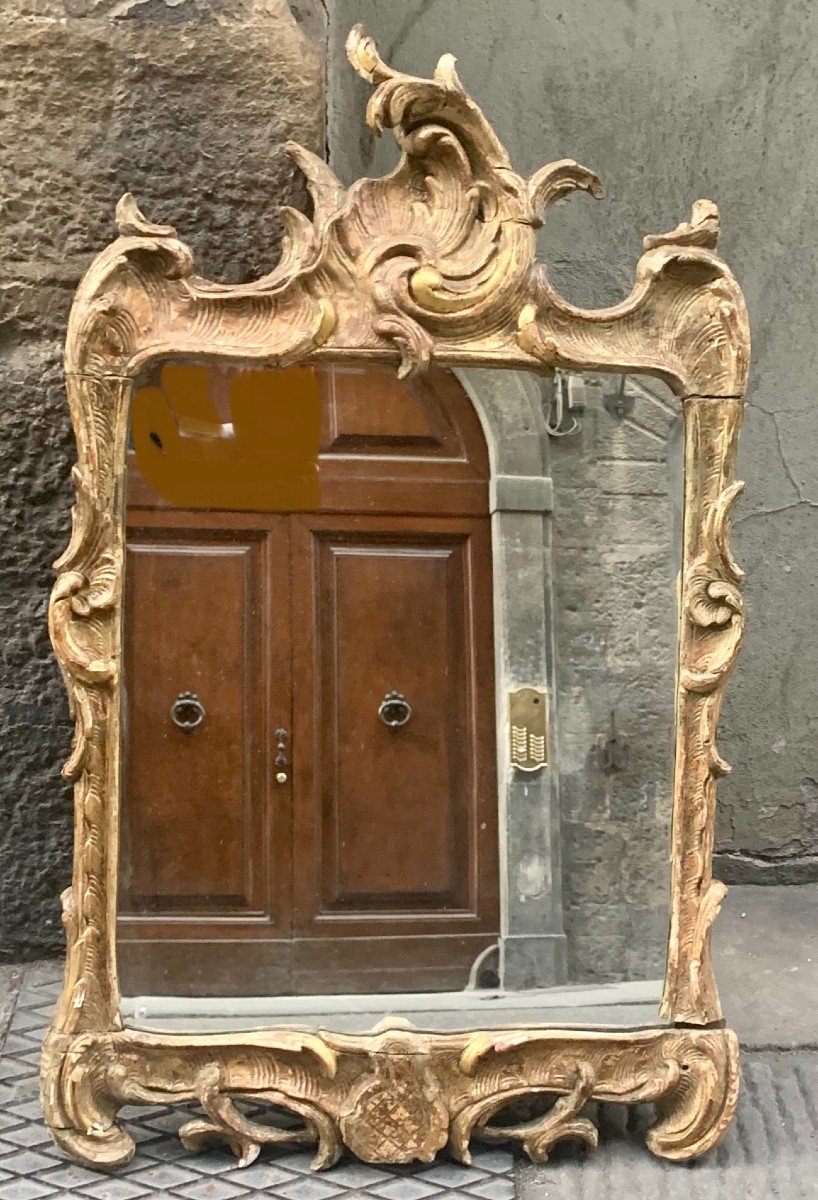 A Rococo Giltwood Mirror. Mid 18th Century.