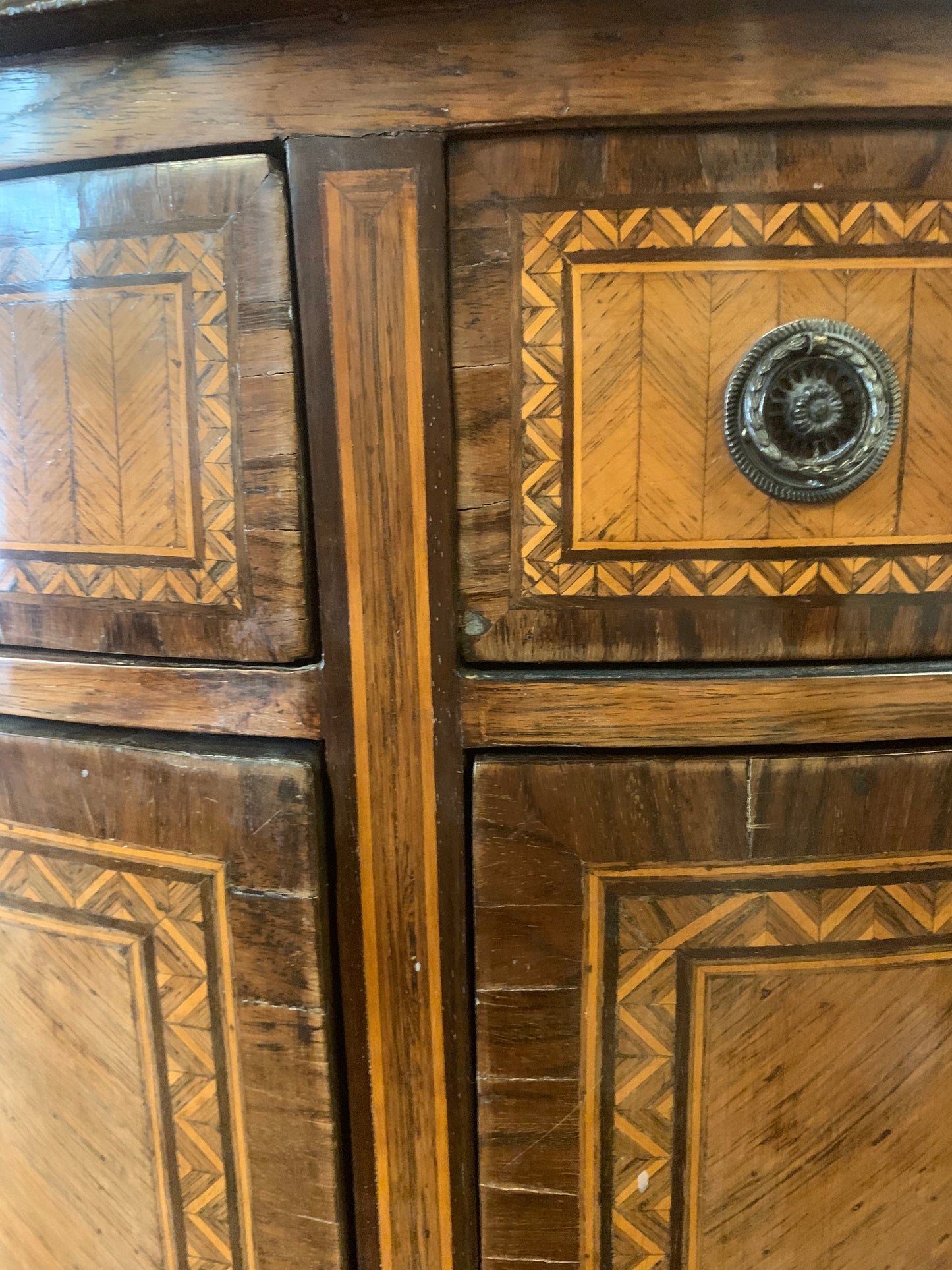 Late XVIII century Demilune Sideboard Veneered and Inlaid in different woods.