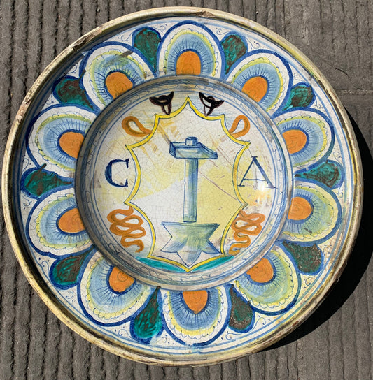 A Lazio Majolica tray with Hammer and Anvil. Viterbo (?) 40 cm diameter