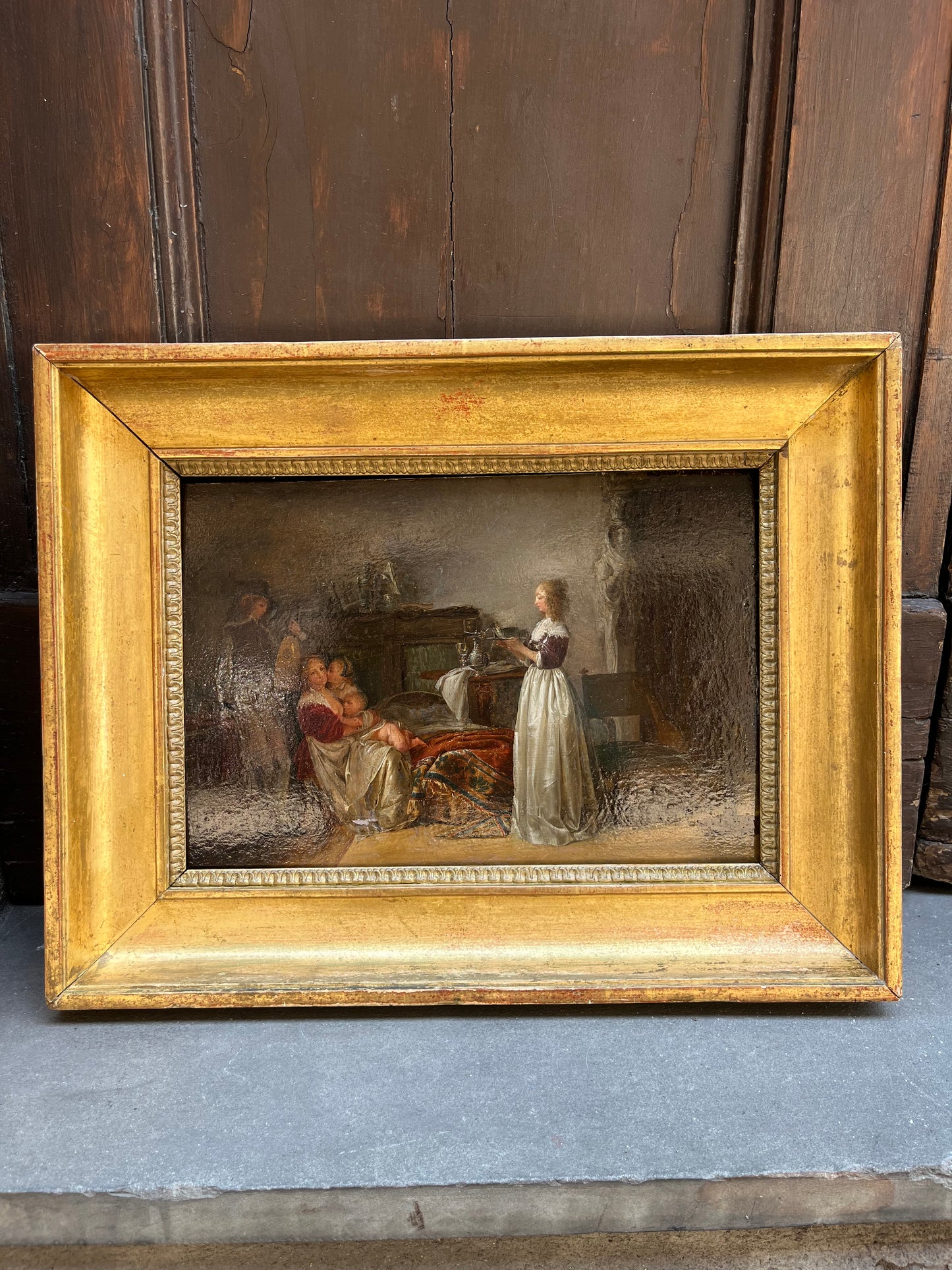 Jean-Baptiste Mallet (1759–1835), attribuito – Interno seicentesco con madre, bambini e musico con liuto