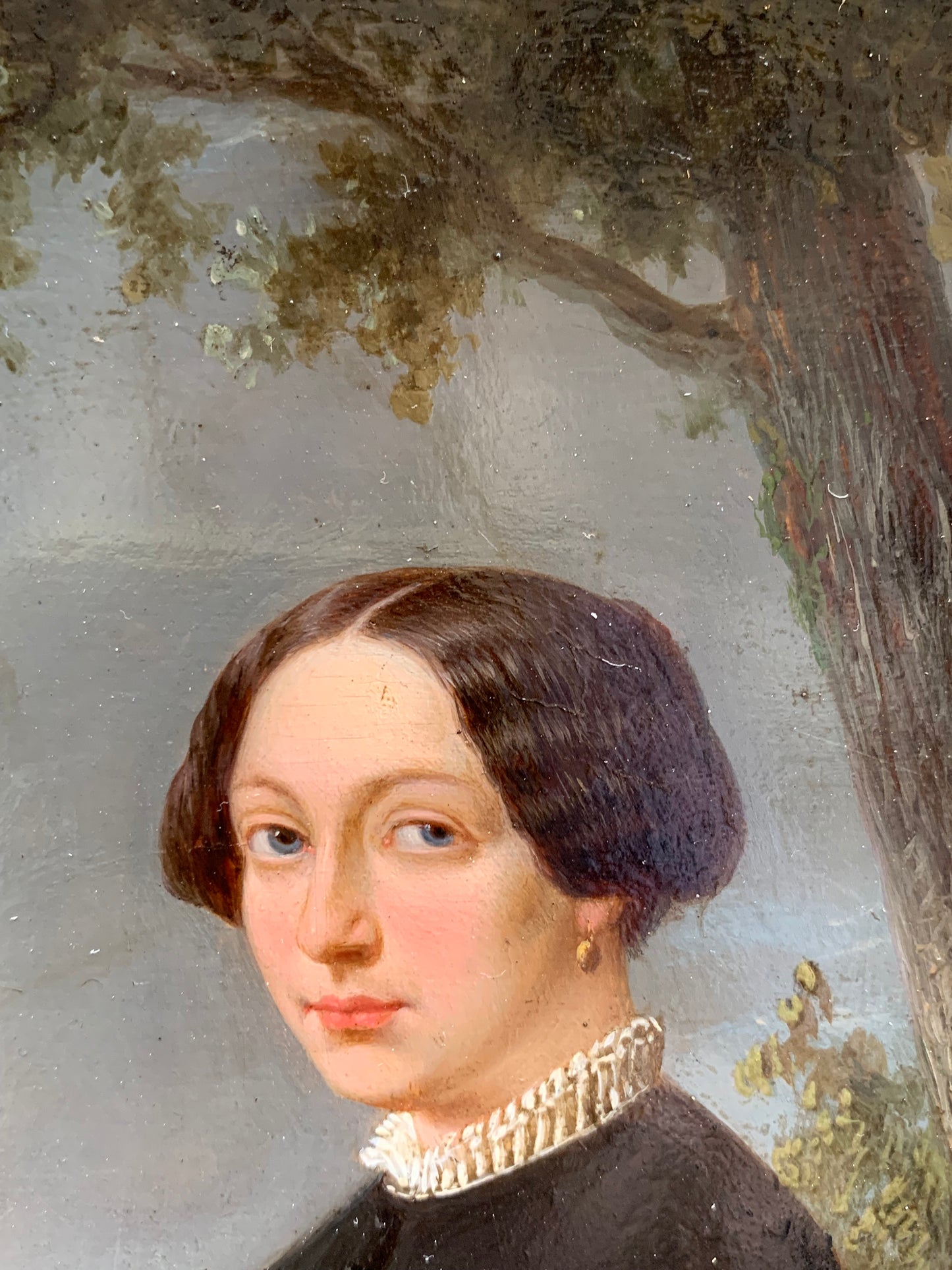 Portrait of an elegant woman in the park with at sunset. Circa 1845.