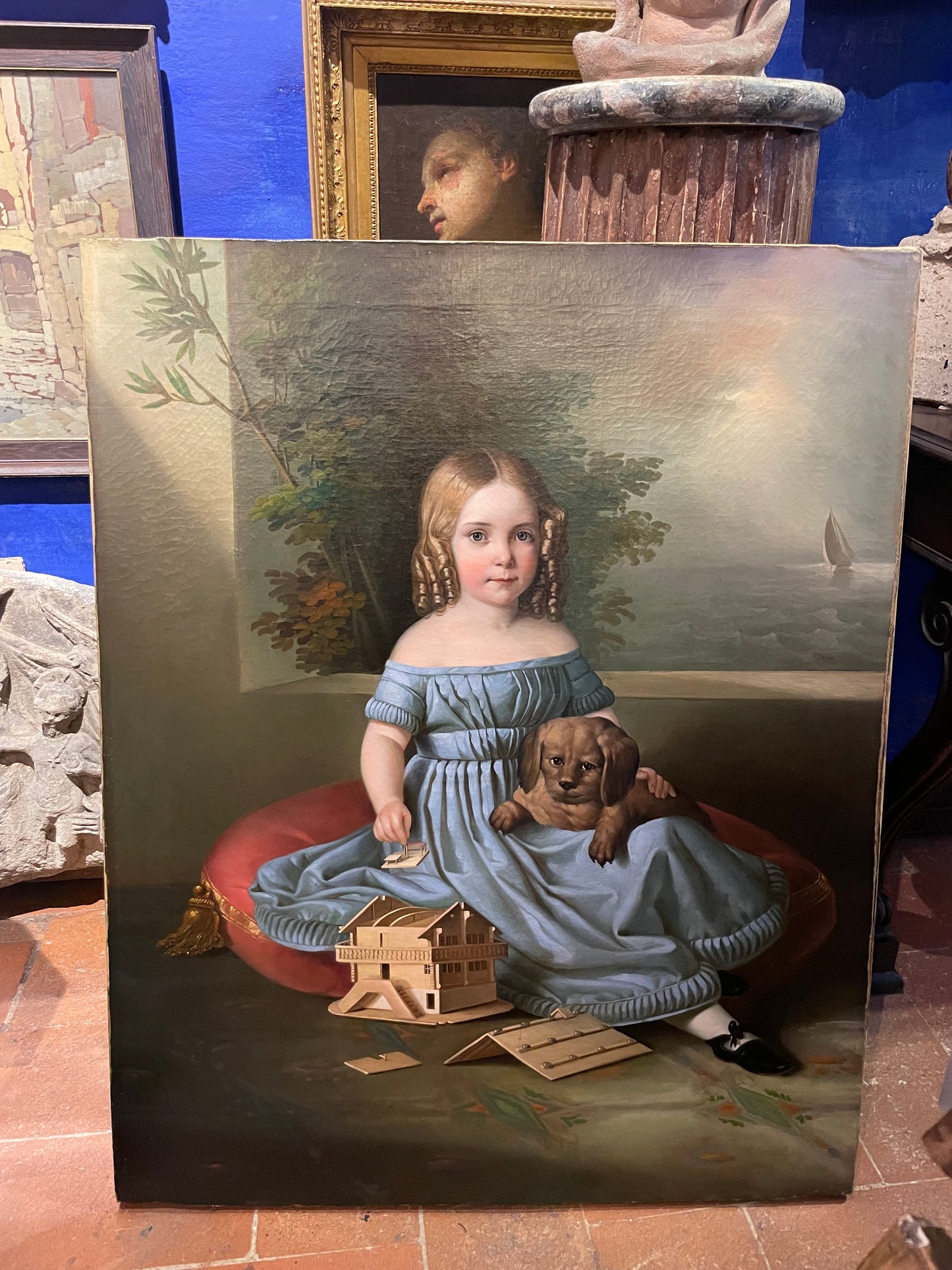 Portrait of a Young Girl with Dog and Tyrolean House Model
Romantic period, circa 1835. Northern Italy or Austria