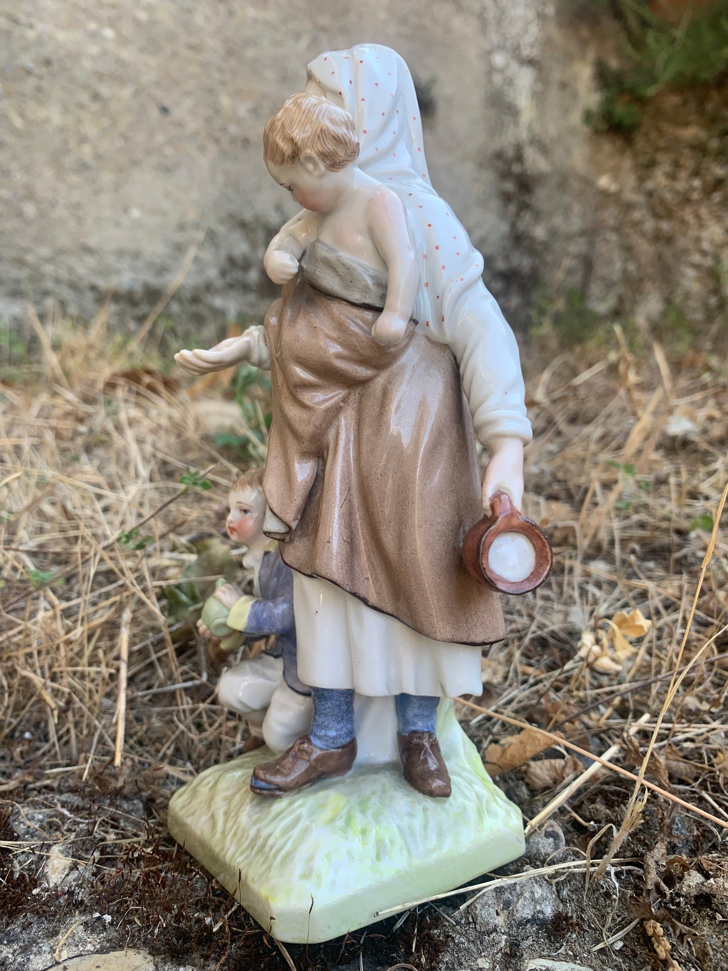 KPM Berlin Porcelain Figurine: "Beggar Woman with Children"