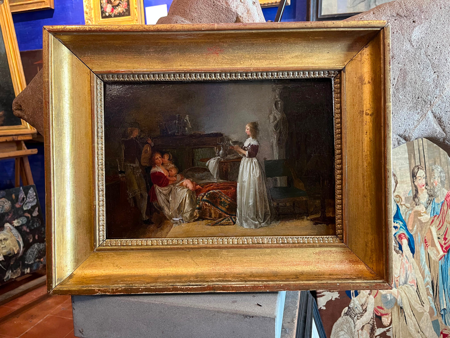 Jean-Baptiste Mallet (1759–1835), attribuito – Interno seicentesco con madre, bambini e musico con liuto
