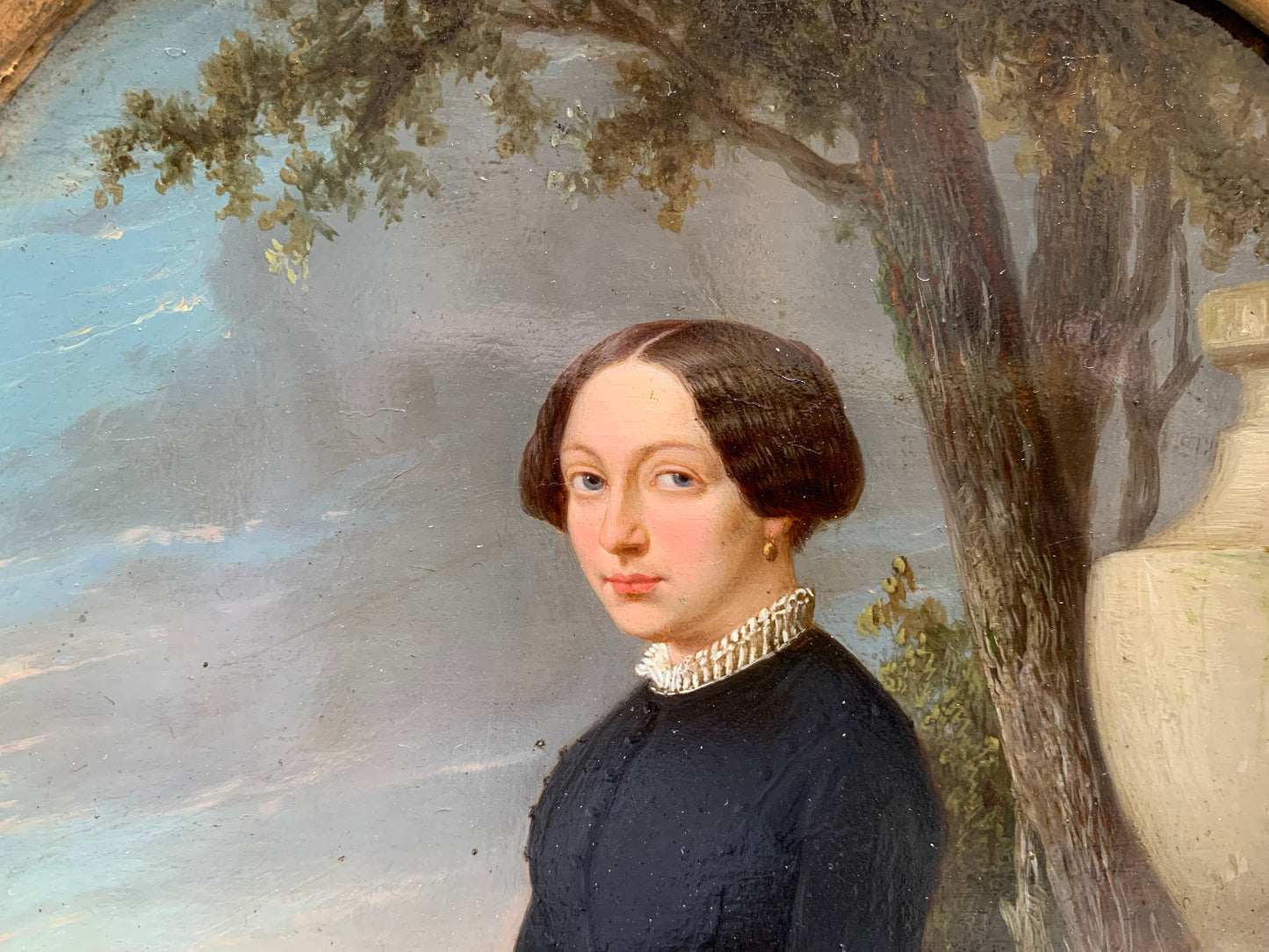 Portrait of an elegant woman in the park with at sunset. Circa 1845.