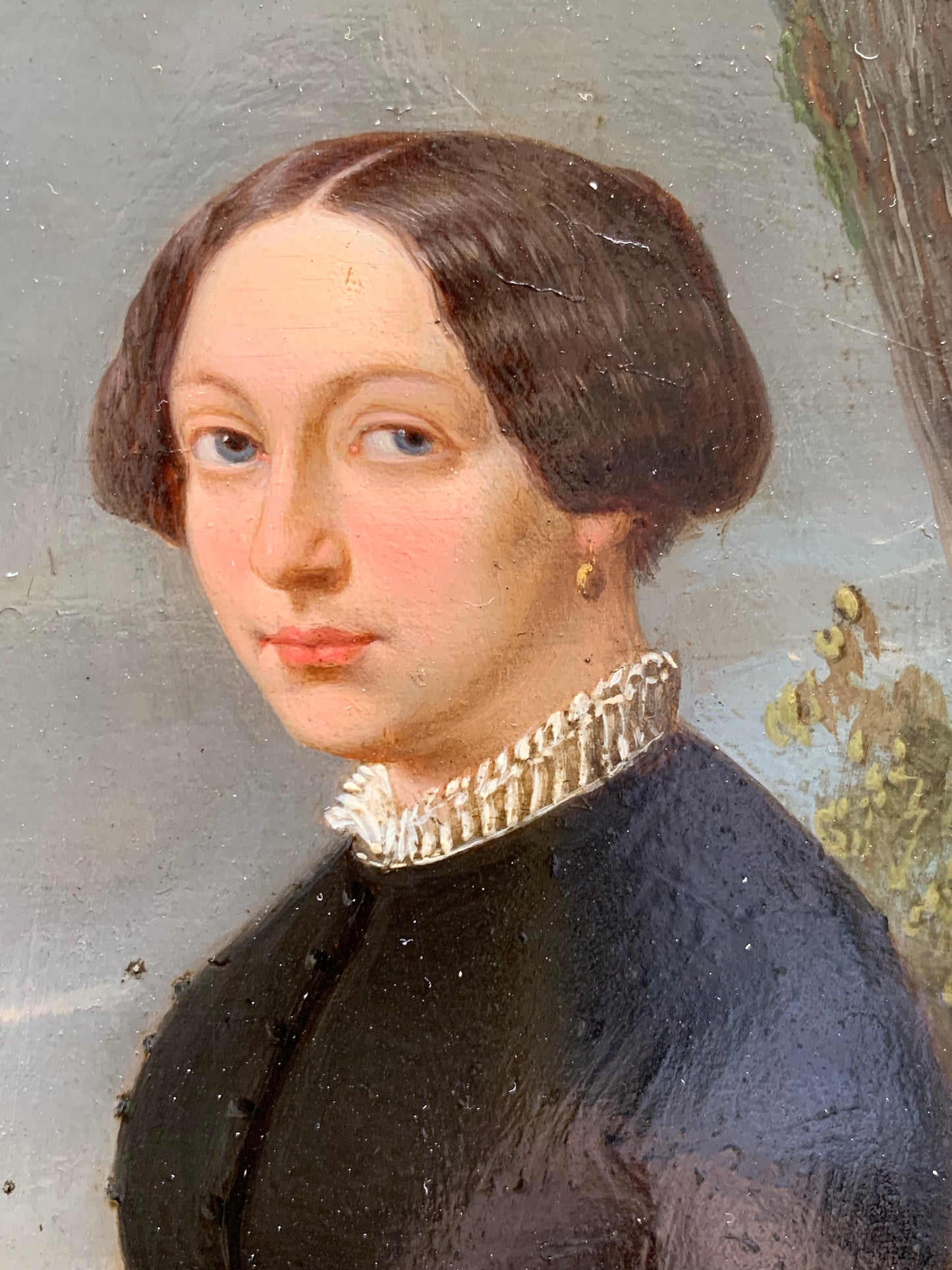 Portrait of an elegant woman in the park with at sunset. Circa 1845.