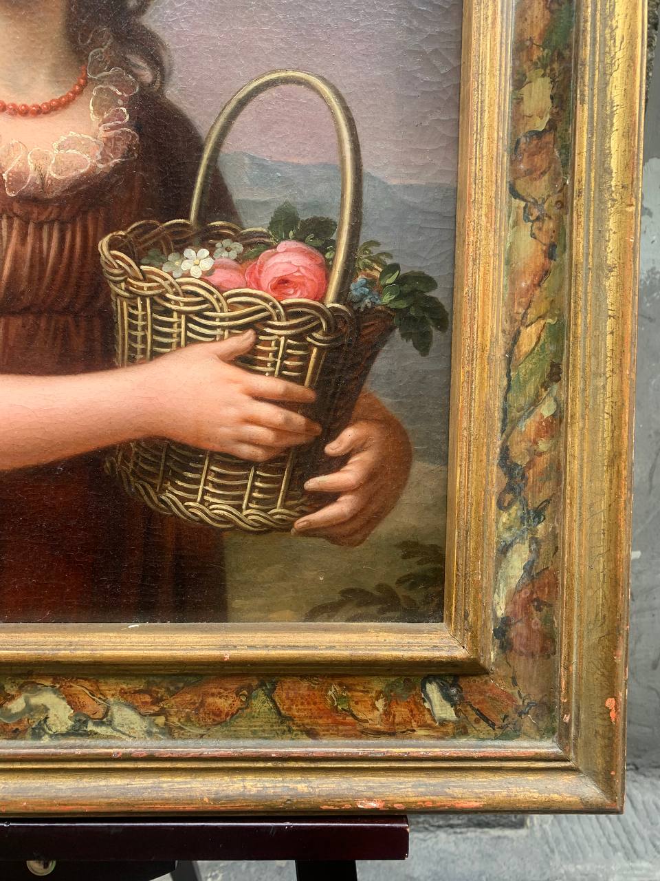 Portrait of a Young Girl with a Basket of Flowers and Coral Necklace, with the Bay of Naples in the Background