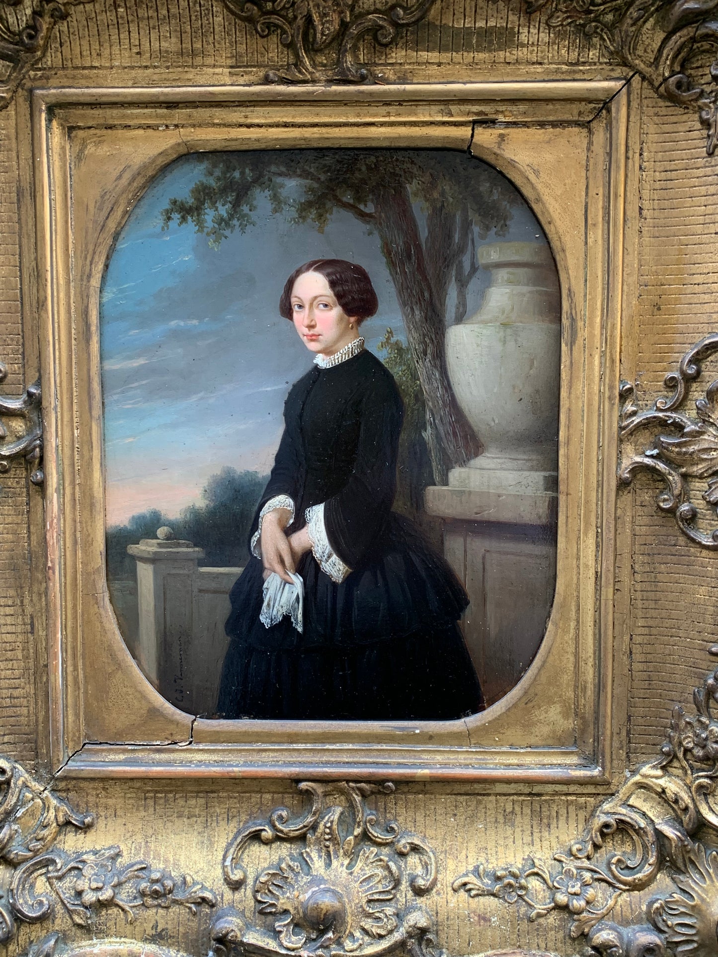 Portrait of an elegant woman in the park with at sunset. Circa 1845.