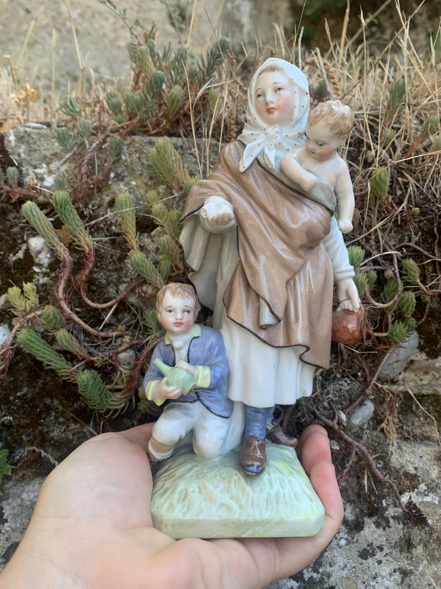 KPM Berlin Porcelain Figurine: "Beggar Woman with Children"