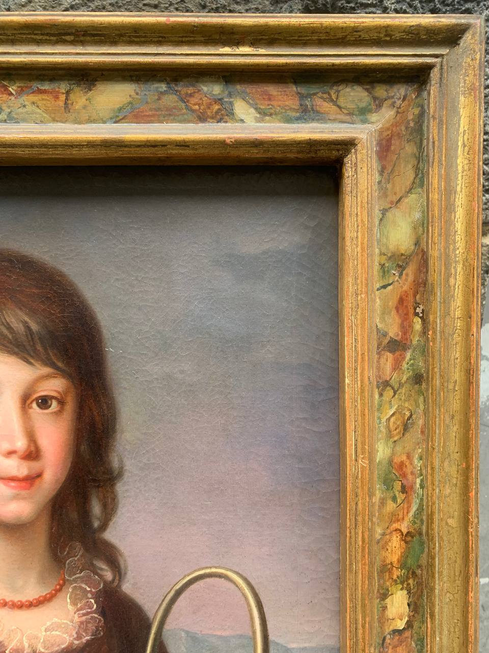 Portrait of a Young Girl with a Basket of Flowers and Coral Necklace, with the Bay of Naples in the Background