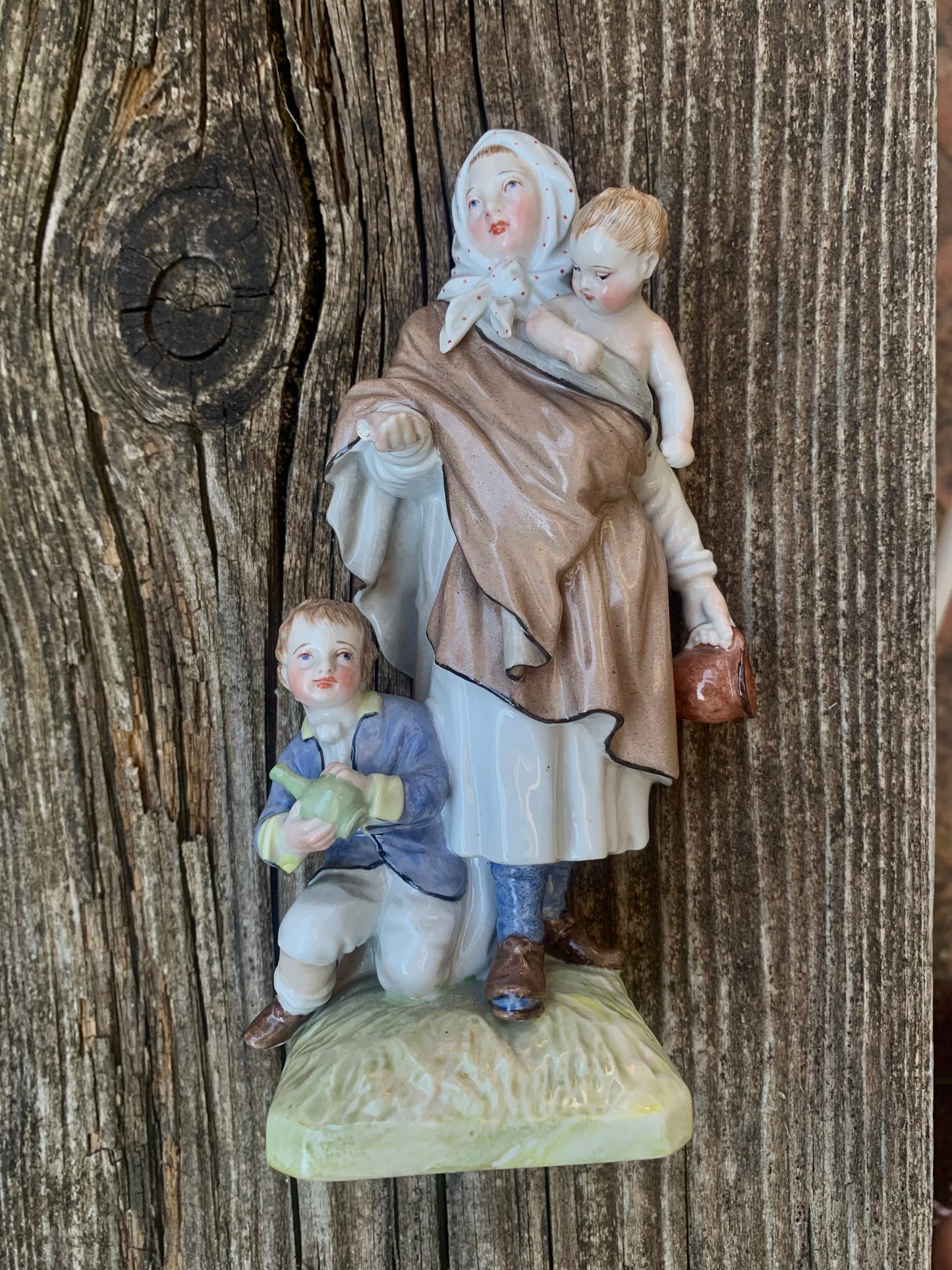 KPM Berlin Porcelain Figurine: "Beggar Woman with Children"