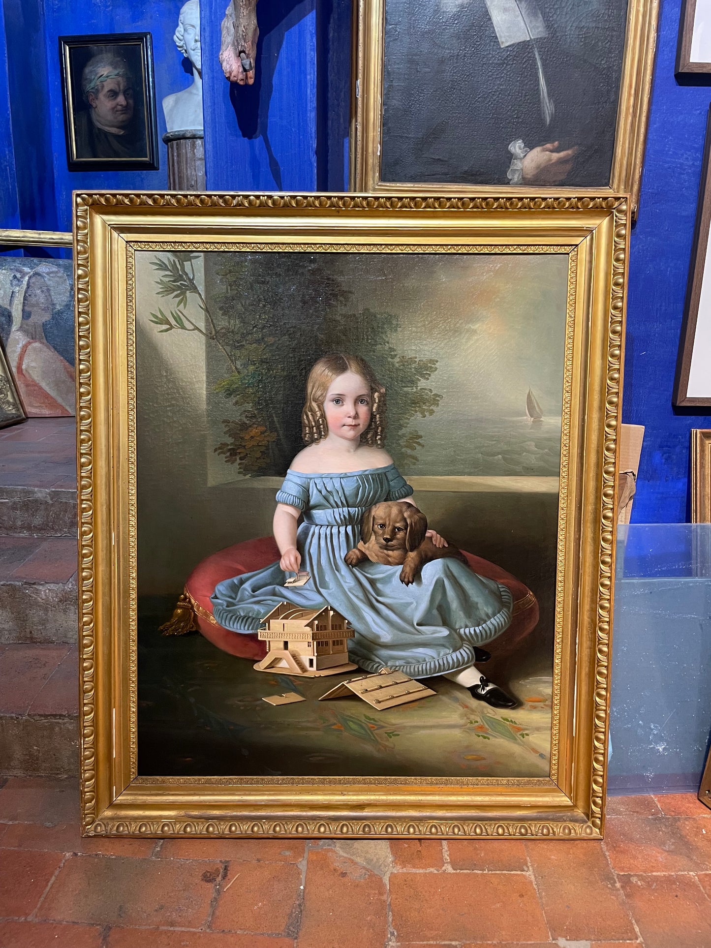 Portrait of a Young Girl with Dog and Tyrolean House Model
Romantic period, circa 1835. Northern Italy or Austria