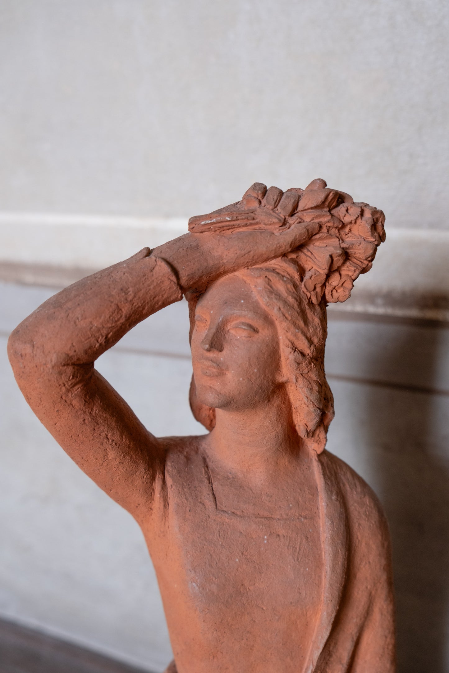 Woman with flowers on head, terracotta sculpture, 1930s-40s, Giorgio Rossi (1894-1981). Tuscan Sculptor.