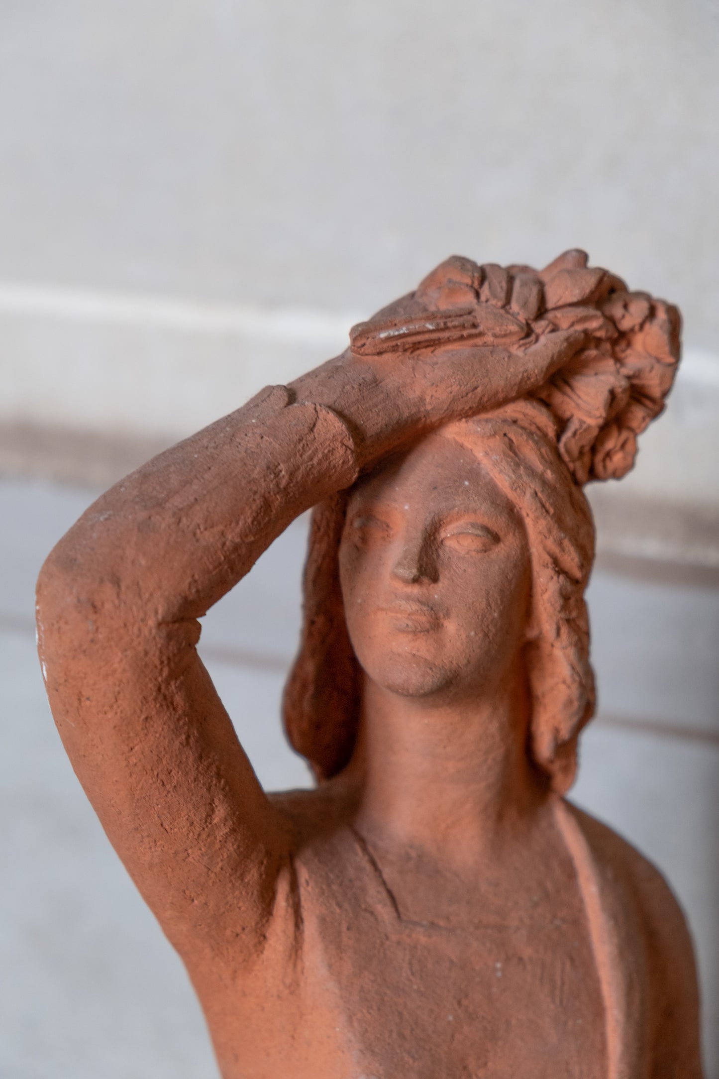 Woman with flowers on head, terracotta sculpture, 1930s-40s, Giorgio Rossi (1894-1981). Tuscan Sculptor.