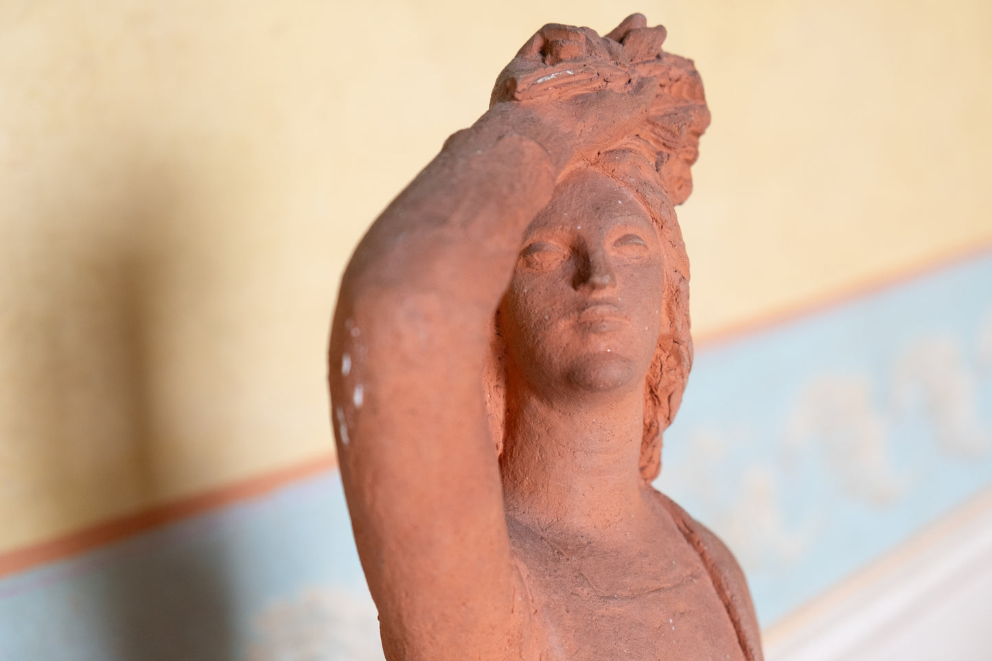 Woman with flowers on head, terracotta sculpture, 1930s-40s, Giorgio Rossi (1894-1981). Tuscan Sculptor.