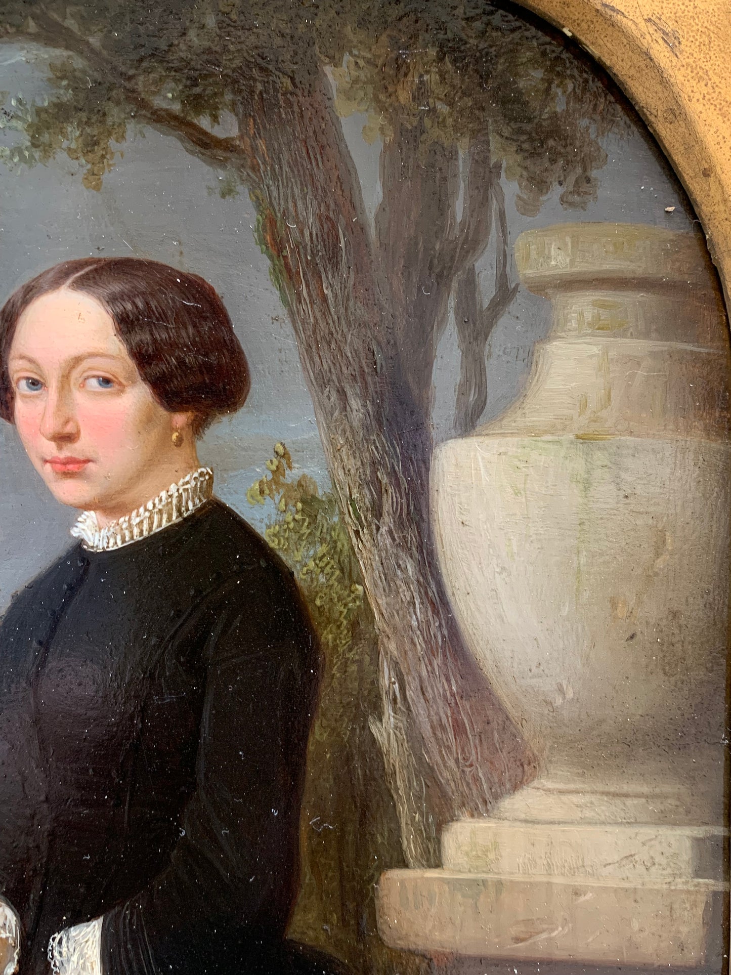 Portrait of an elegant woman in the park with at sunset. Circa 1845.