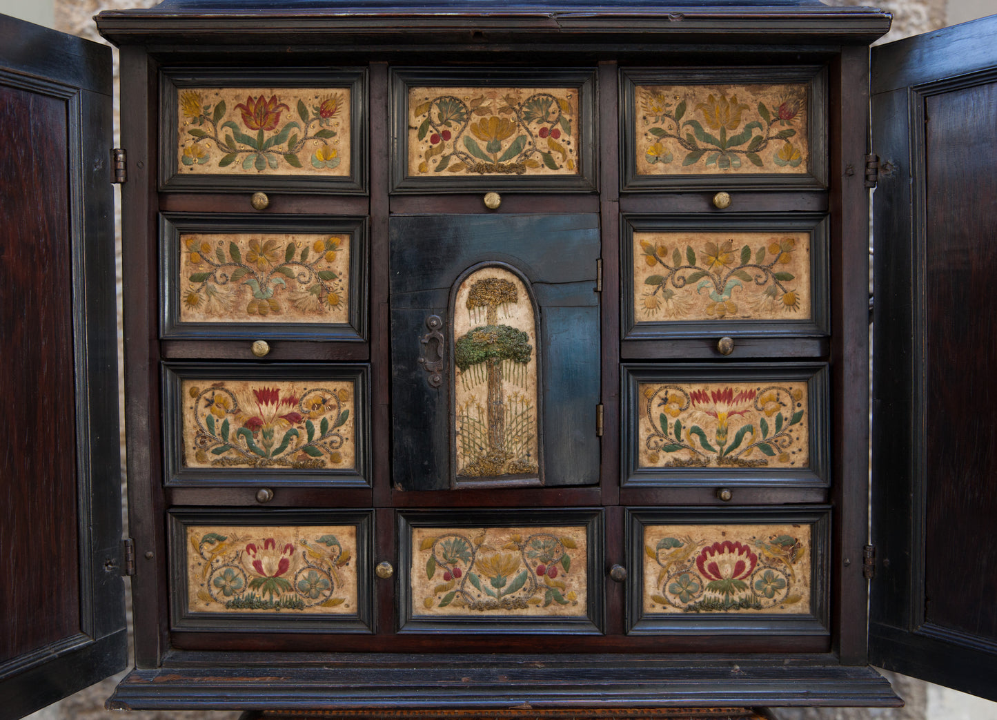 Very rare Collector's Cabinet, Antwerp, 17th century. Embroidered panels.