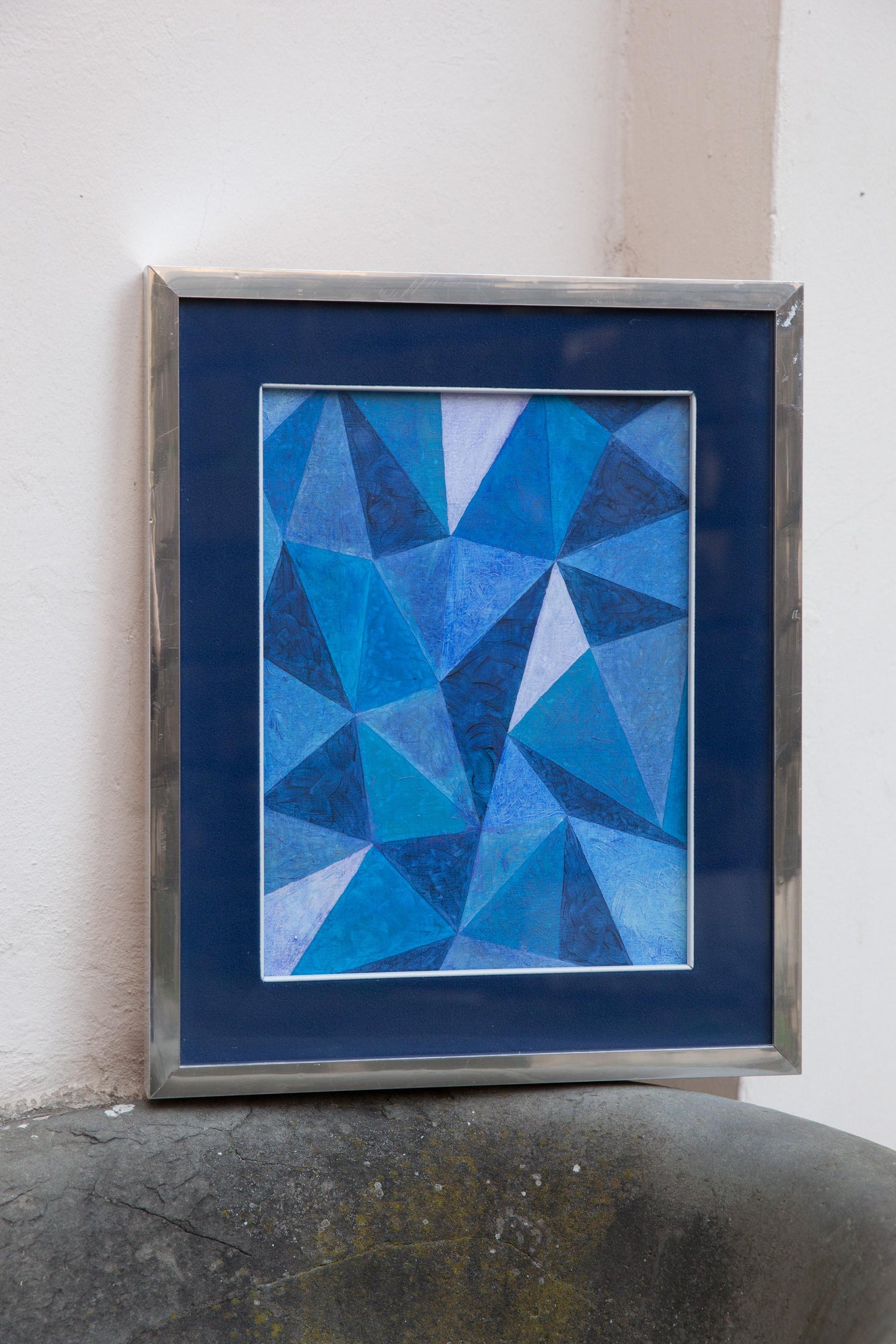 Abstract painting with geometric play of blue triangles. Circa 1970