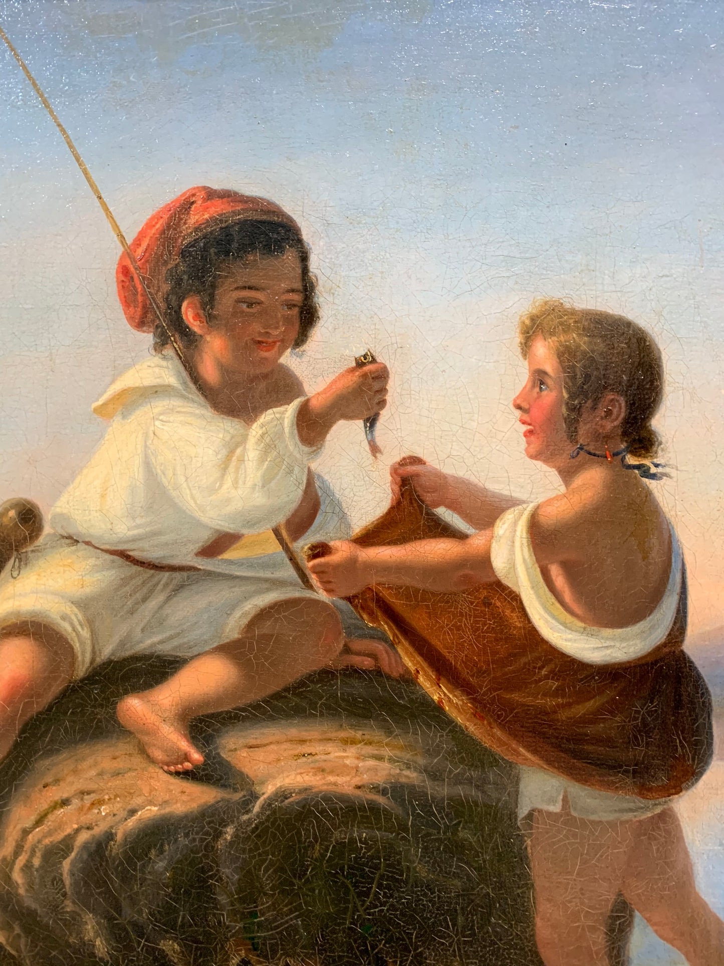 Small Neapolitan fishermen. 19th century.Gulf of Naples with the volcano of Vesuvius.