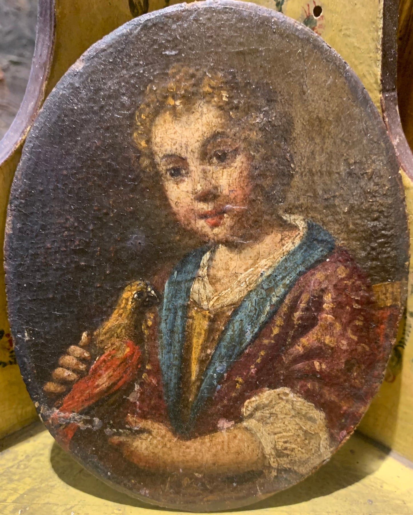 Portrait of a Child with a Bird.  Attributed to Antonio Amorosi (1660-1738)