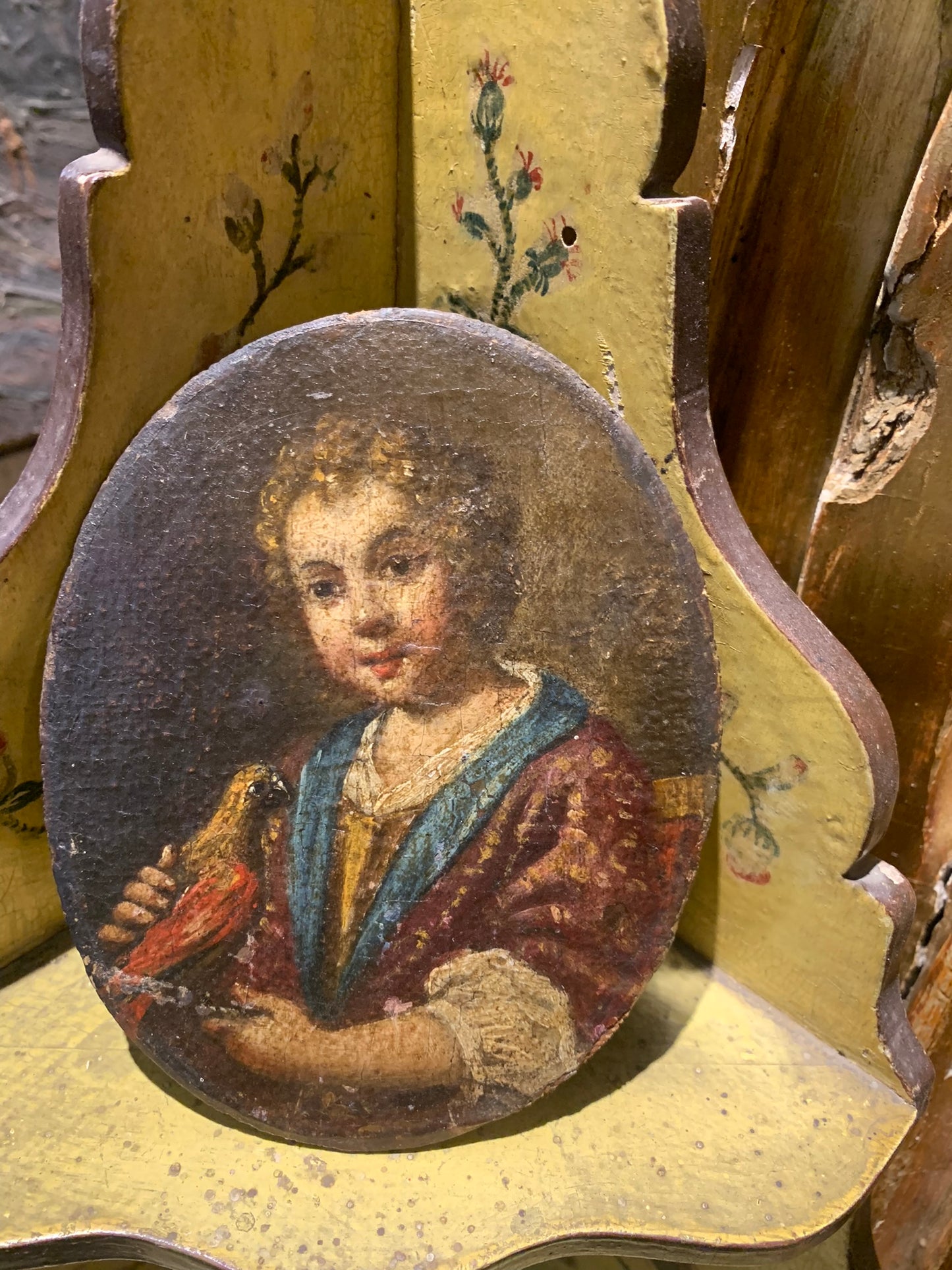 Portrait of a Child with a Bird.  Attributed to Antonio Amorosi (1660-1738)