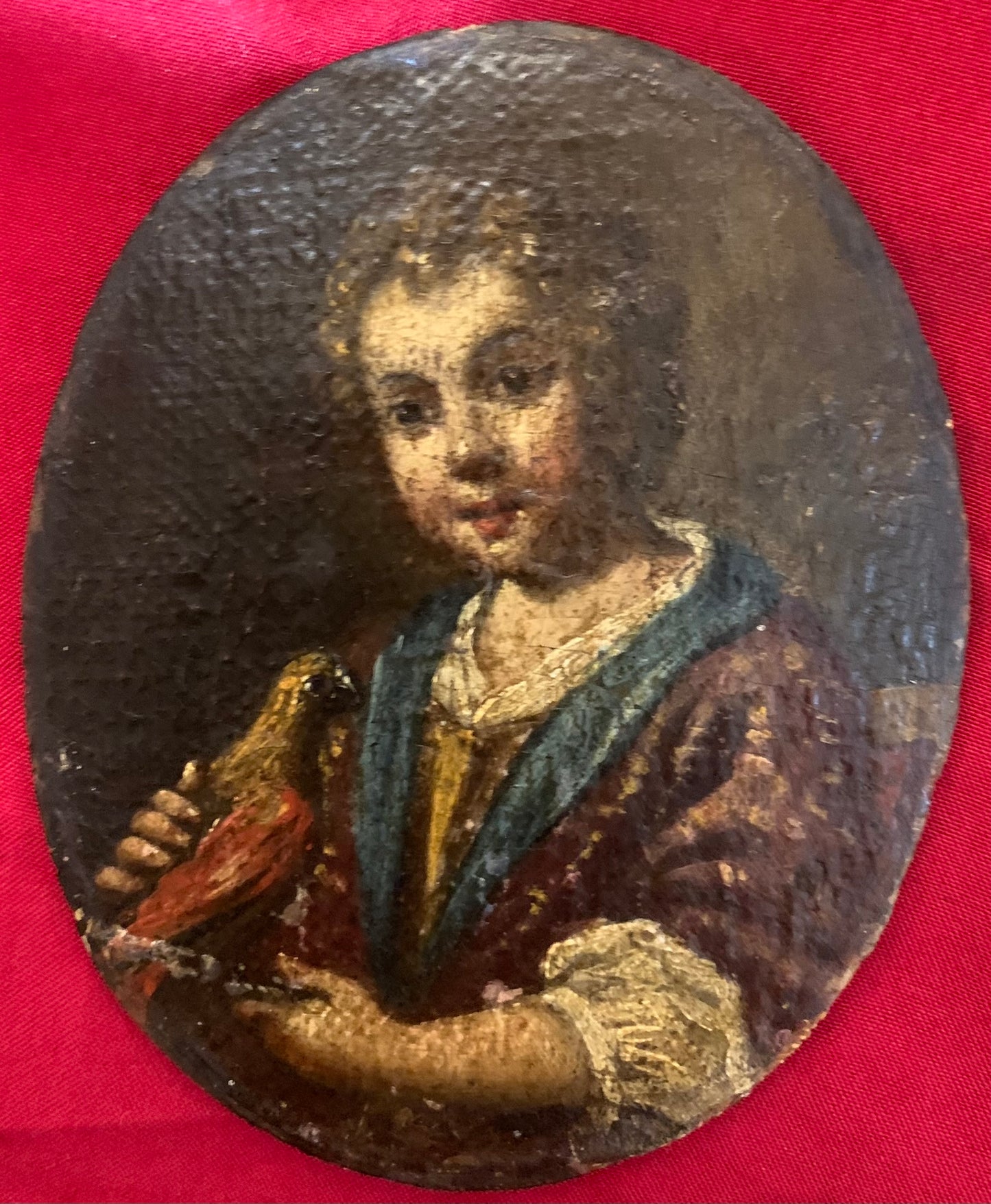 Portrait of a Child with a Bird.  Attributed to Antonio Amorosi (1660-1738)