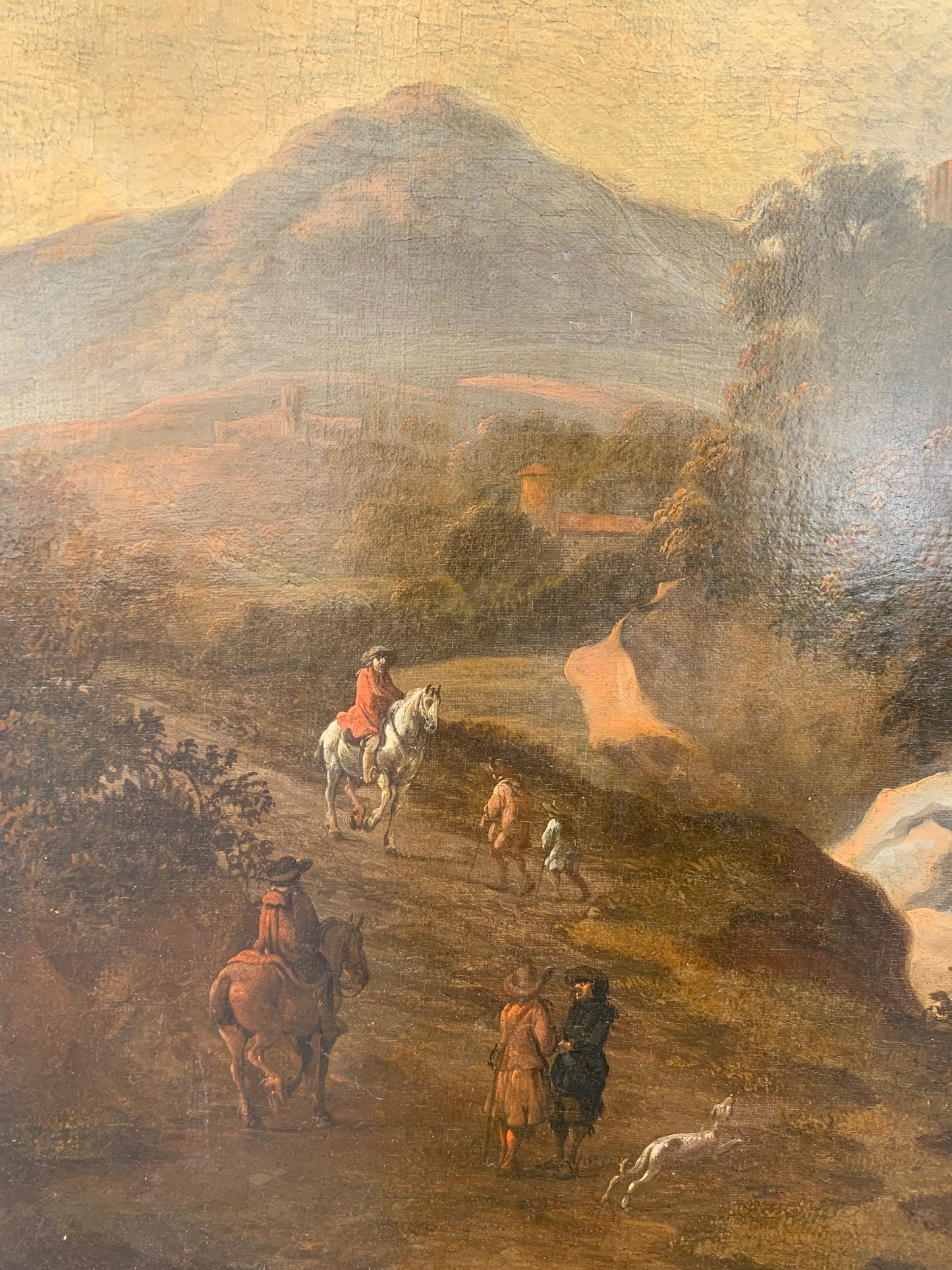 XVII century Dutch school Italianate rocky landscape with archaeological ruins and horse riders with dogs.