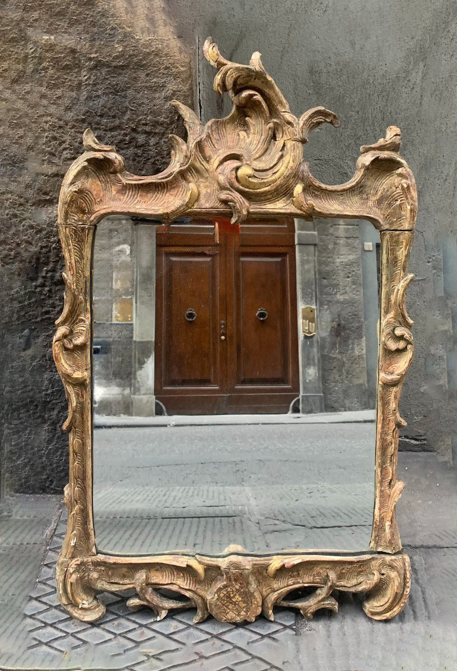 A Rococo Giltwood Mirror. Mid 18th Century.