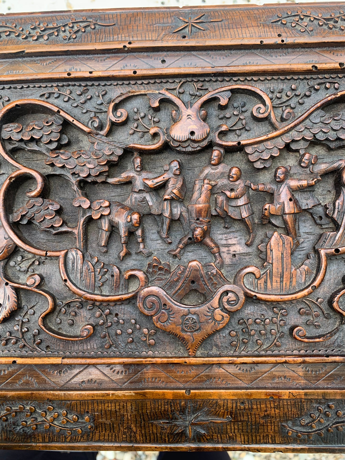 Chinese wooden casket carved with fruit, pumpkins and oriental characters.  19th century.