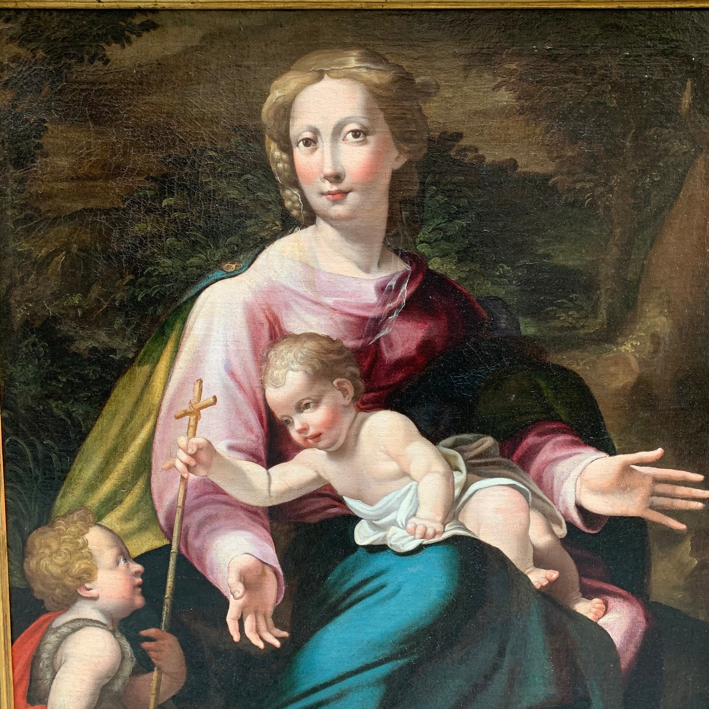 Late XVI century Madonna with child and St. John Baptist. Aemilian school.