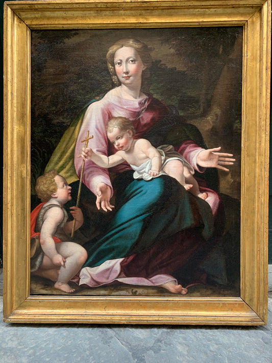 Late XVI century Madonna with child and St. John Baptist. Aemilian school.