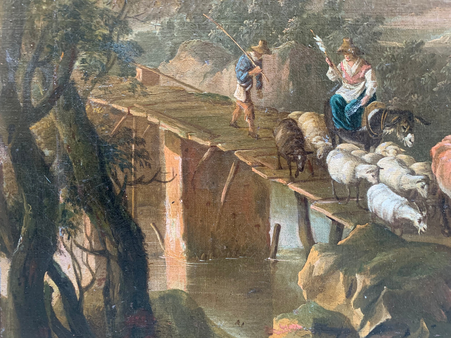XVIII century. Pastoral landscape with shepherds, bridge and rocky lanscape.